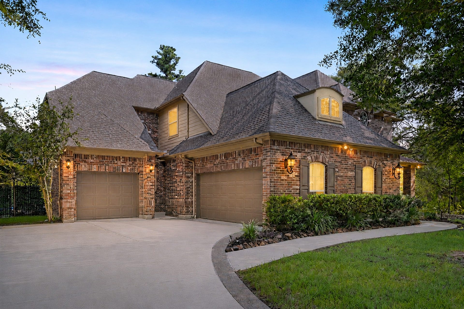 Impressive curb appeal! Beautiful brick exterior, a spacious 3-car garage on a corner lot.
