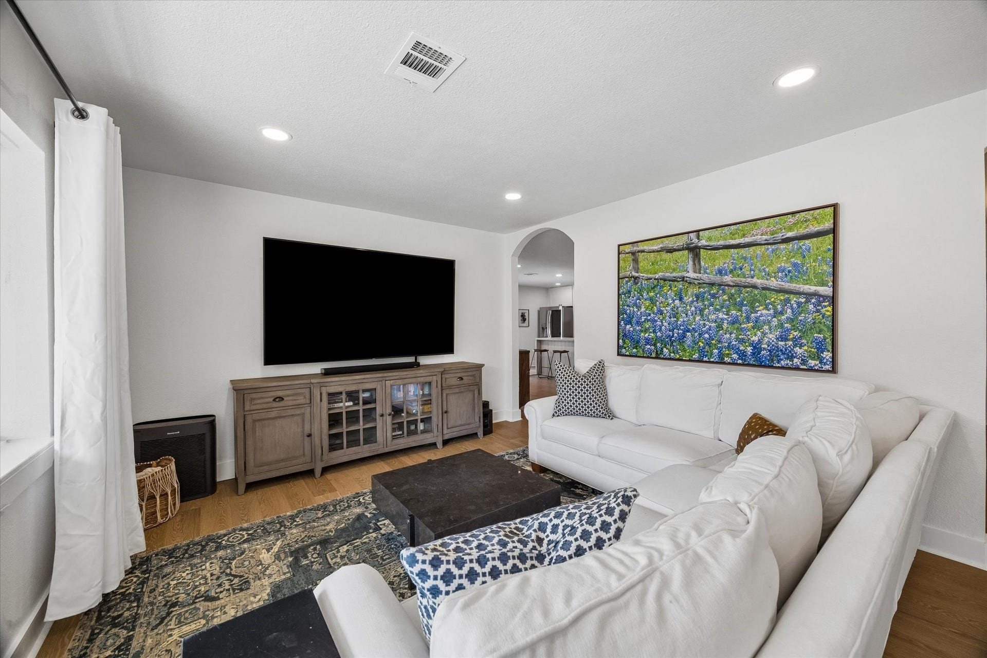 2018 Libbey Drive, Houston, TX 77018 Natural light fills the spacious living room, complemented by recessed lighting, wood flooring and plenty of room to gather or unwind.