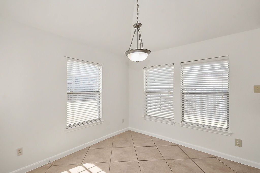 14903 Meridian Park Lane, Humble, TX 77396 The breakfast room overlooks the backyard.
