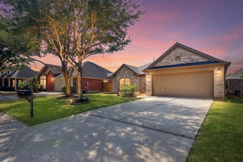 14903 Meridian Park Lane, Humble, TX 77396 Inviting curb appeal greet you as you drive up to this Fall Creek home.