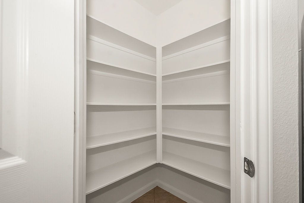 14903 Meridian Park Lane, Humble, TX 77396 Imagine all your favorite food and snacks here in this roomy pantry.