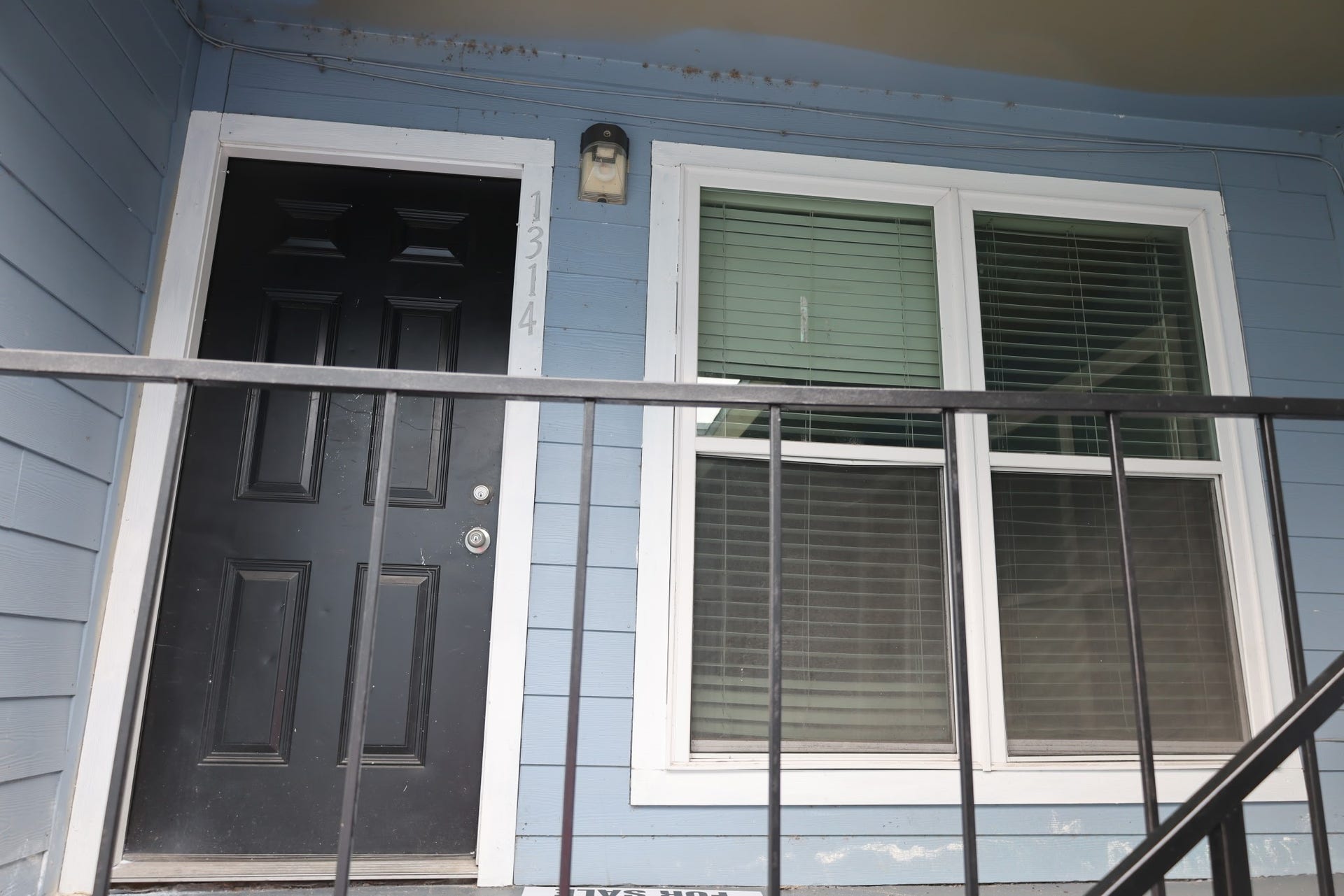 5625 Antoine Drive, #1314, Houston, TX 77091 Private second-floor entry with a covered landing.