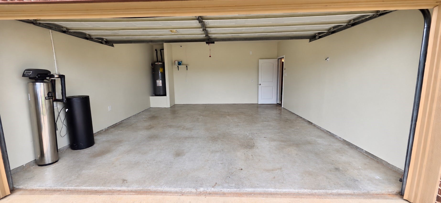 Garage, showcasing water softener & hot water heater