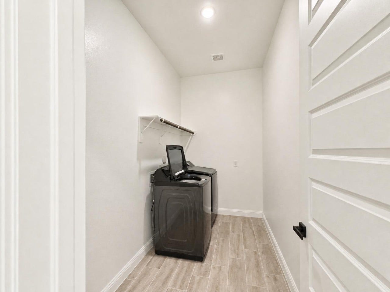 2004 Terra Rose Drive, Katy, TX 77493 This home provides great storage with a large utility room, coat closet, and two additional closets upstairs.