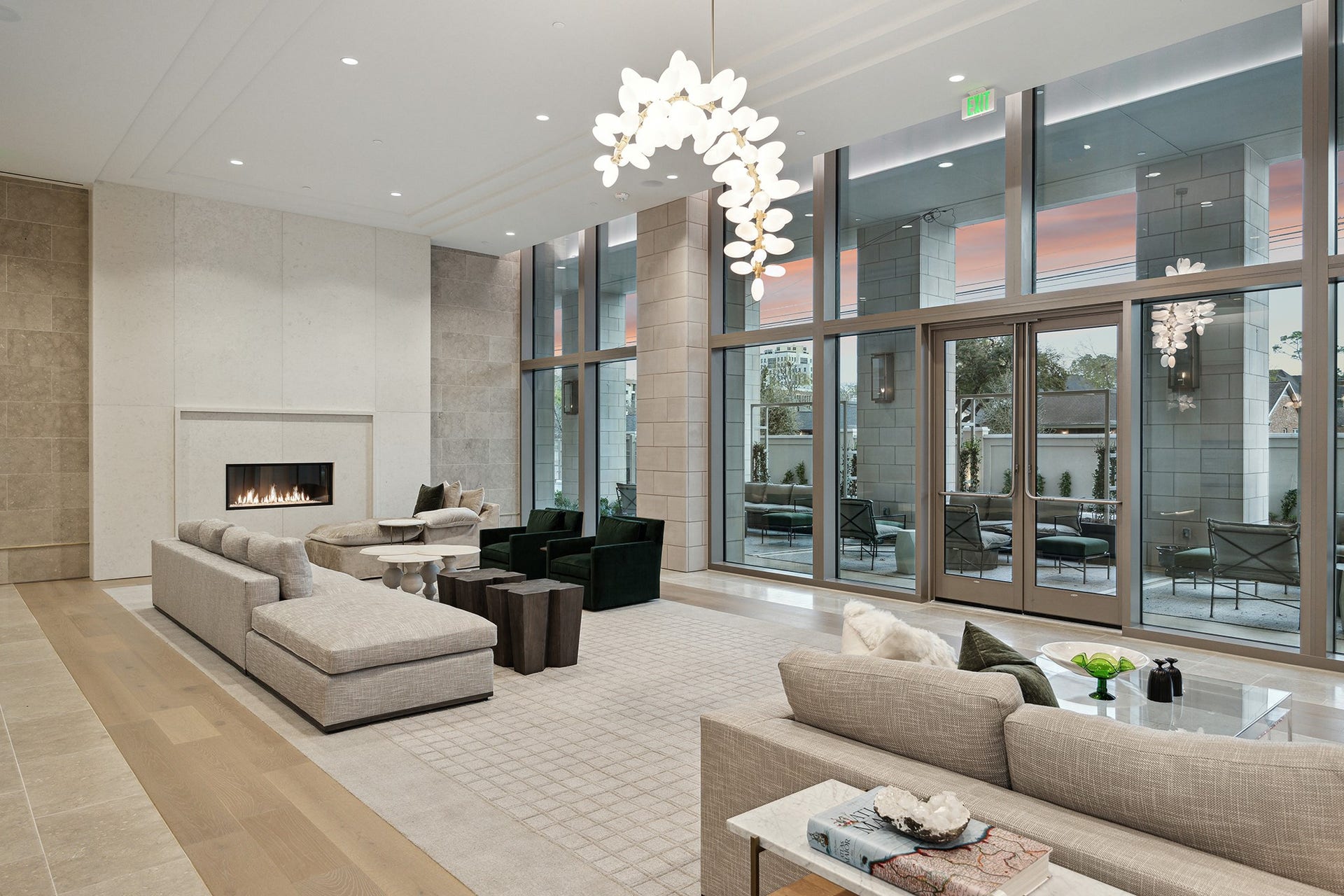 5656 San Felipe Street, #1005, Houston, TX 77056 THE HAWTHORNE'S impressive lobby lounge makes a welcoming first impression with a soft neutral color palette and comfortable seating areas arranged alongside a gas fireplace and floor-to-windows overlooking a covered terrace.