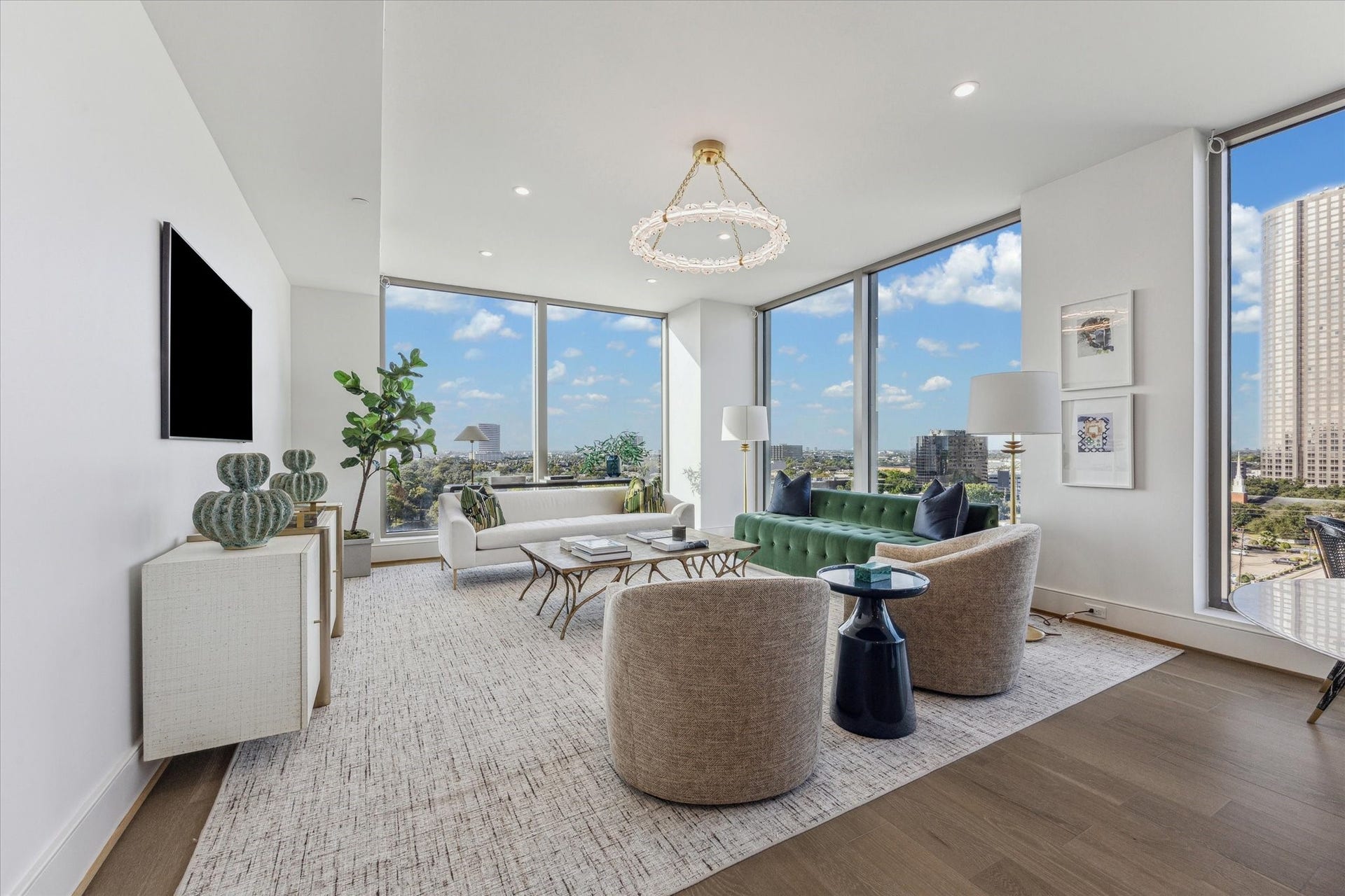 5656 San Felipe Street, #1005, Houston, TX 77056 Ceiling to floor windows radiating natural light throughout. Photos are of a similar unit with the same floorplan