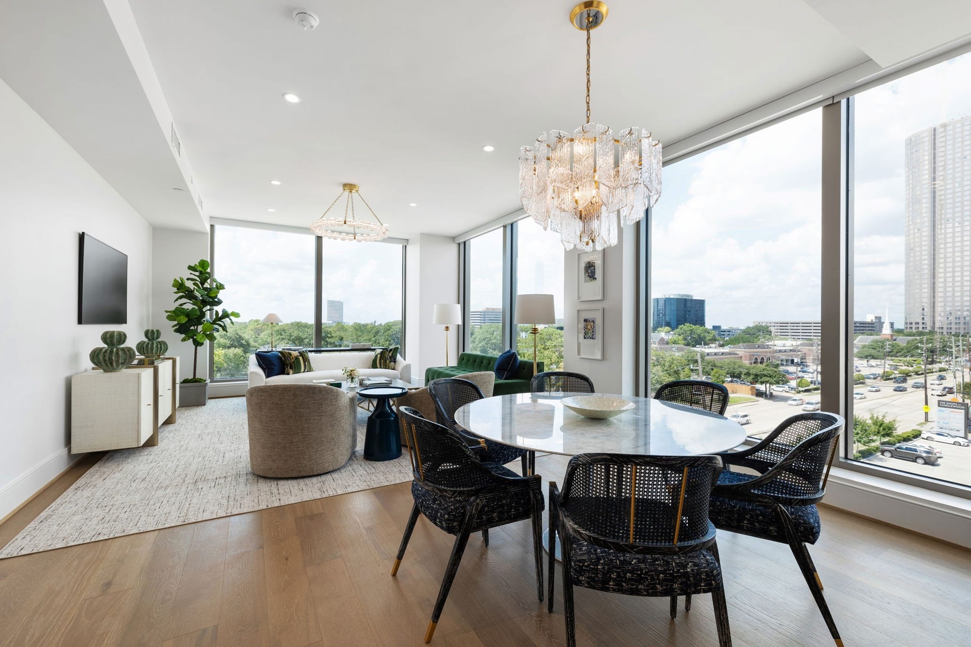5656 San Felipe Street, #1005, Houston, TX 77056 Seamless living in an open-concept layout, framed by breathtaking views of the city skyline. Photos are of a similar unit with the same floor plan