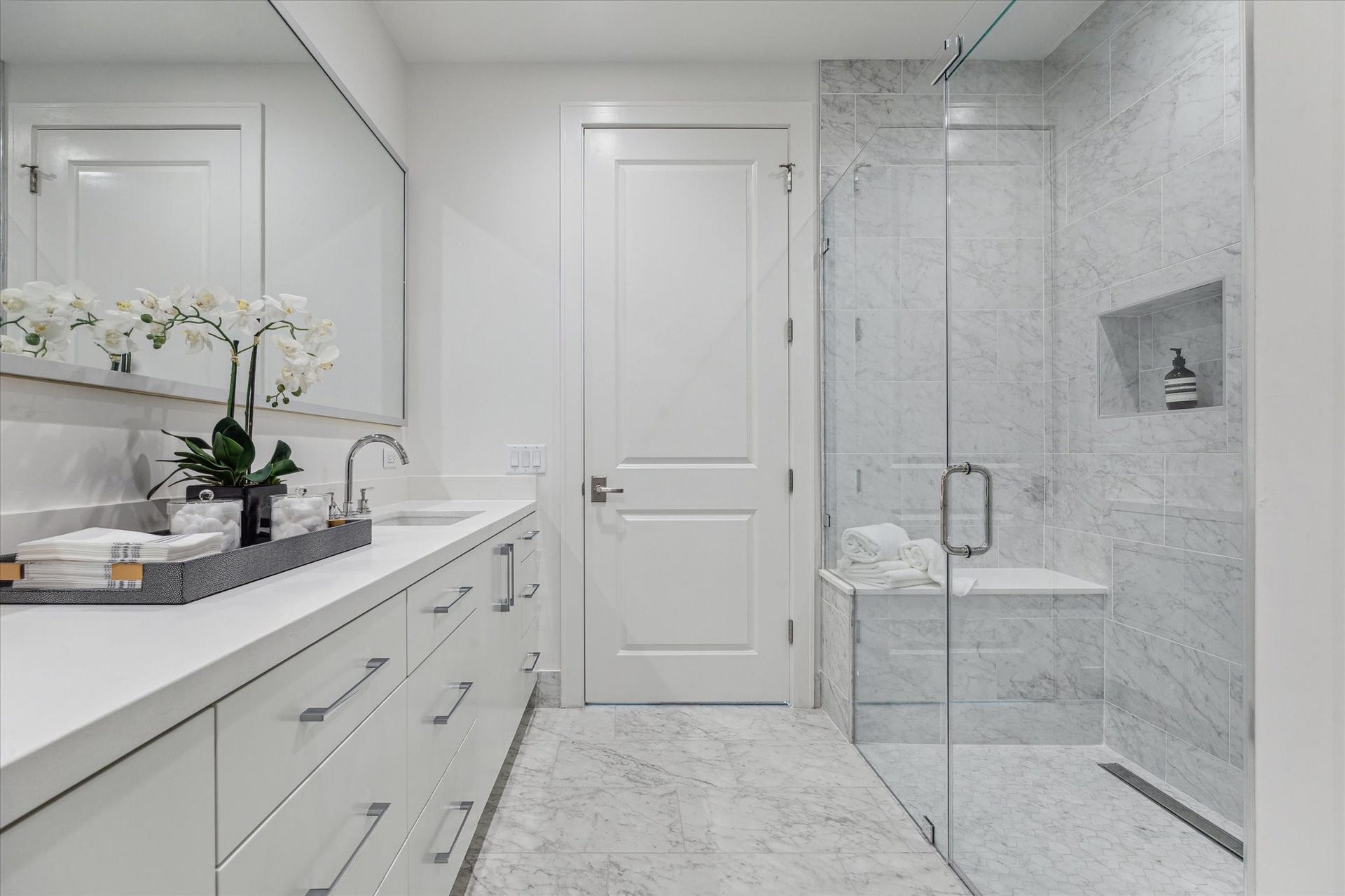 5656 San Felipe Street, #1005, Houston, TX 77056 Alternate view of the primary bathroom highlighting the walk-in shower. Photos are of a similar unit with the same floor plan