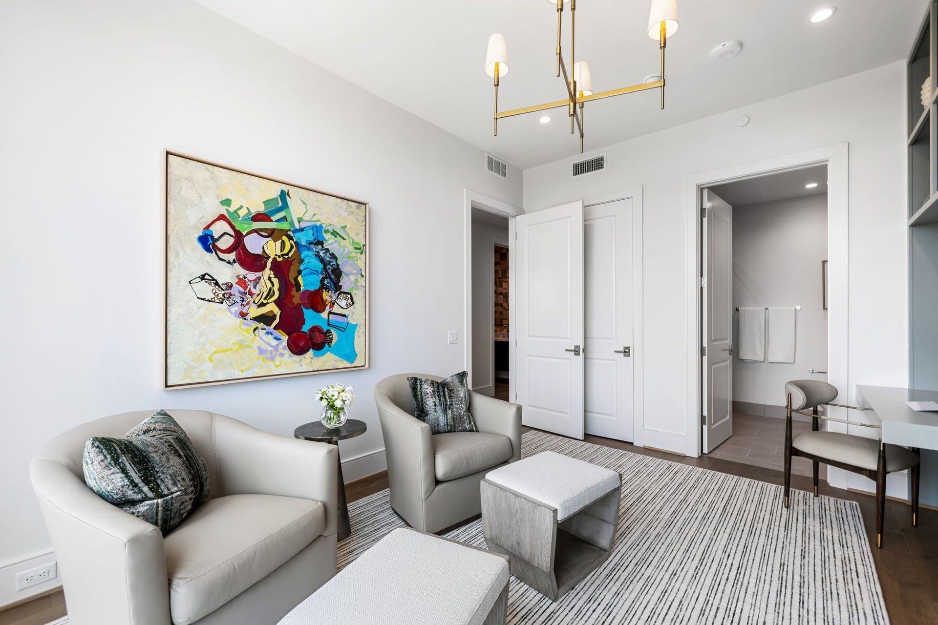 5656 San Felipe Street, #1005, Houston, TX 77056 Another perspective of the secondary bedroom highlighting a dedicated space for relaxation. Photos are of a similar unit with the same floor plan