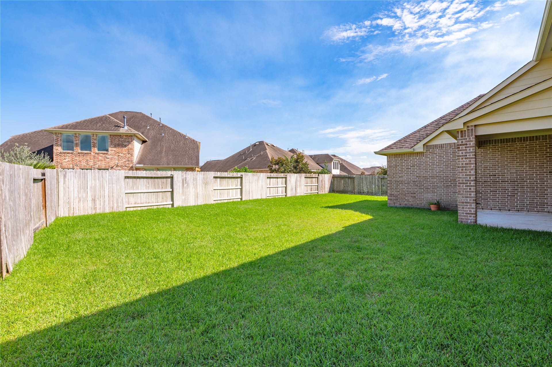 2322 Ashley Falls Lane, League City, TX 77573 Pool sized backyard; home is fully bricked on all four sides.