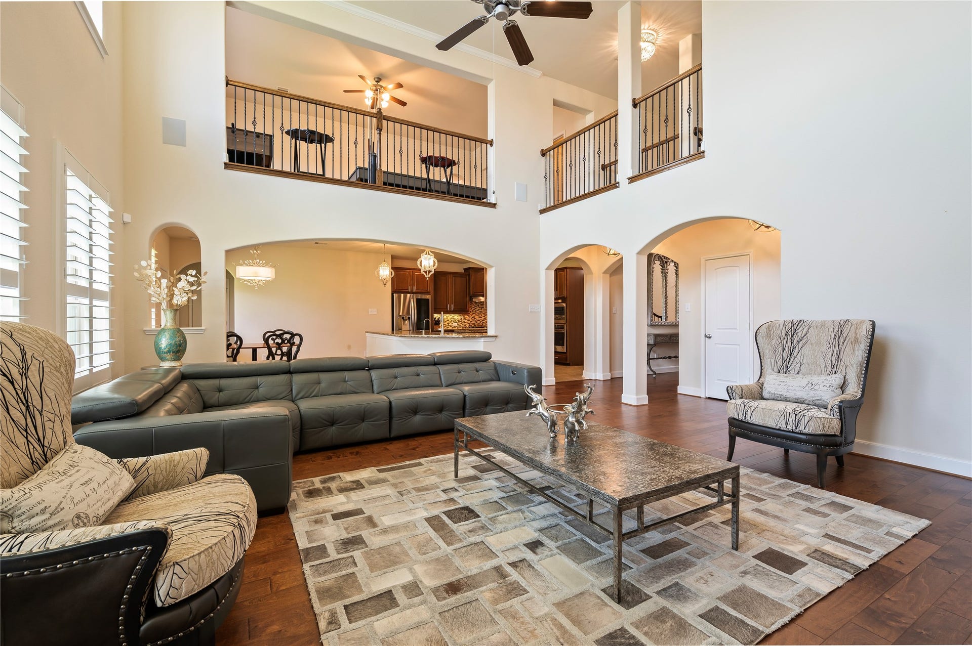 2322 Ashley Falls Lane, League City, TX 77573 Surround sound speakers in the family room, and desirable open-concept family room flows seamlessly into the kitchen and breakfast areas.
