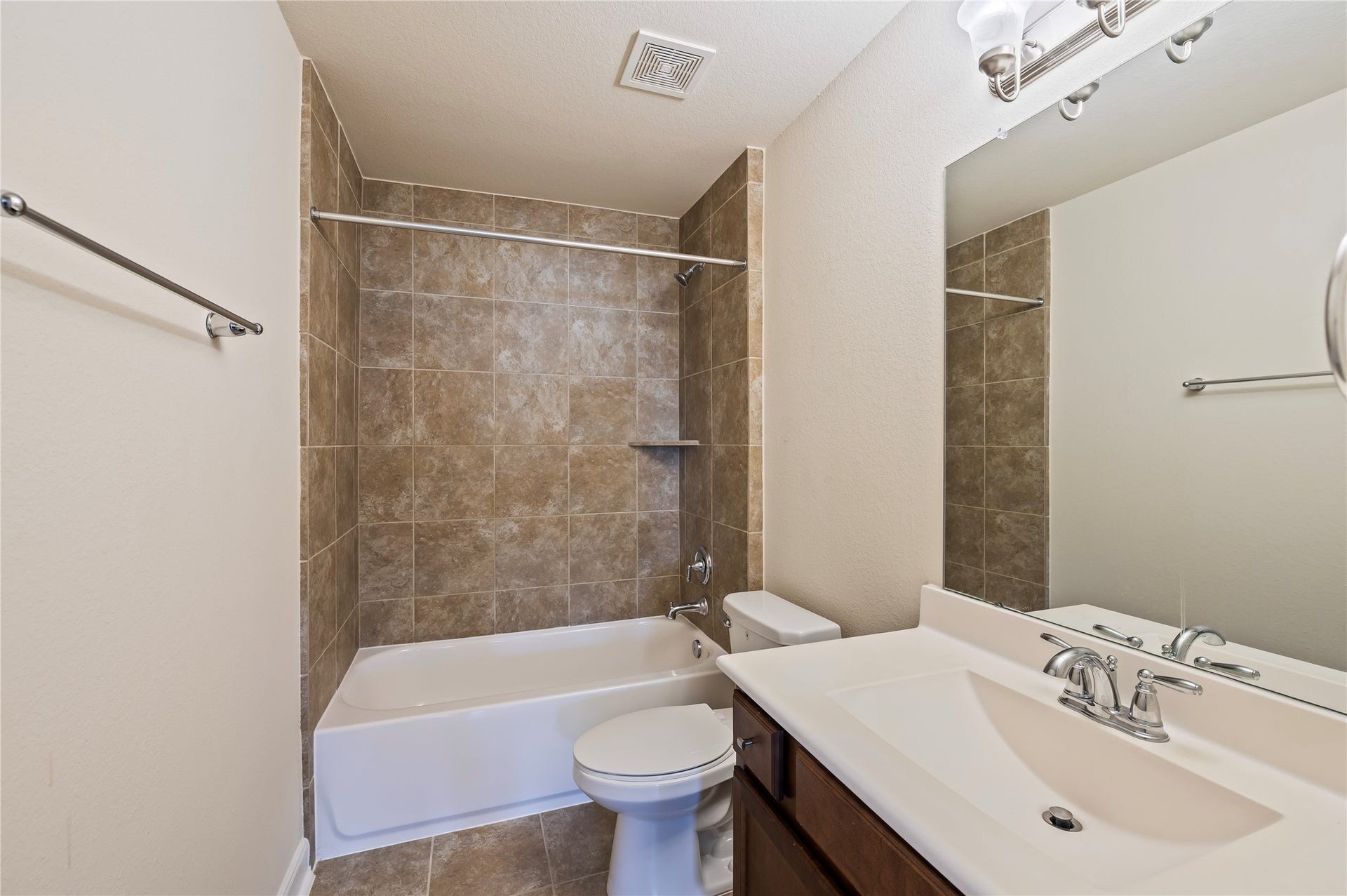 2322 Ashley Falls Lane, League City, TX 77573 3rd full bathroom upstairs with tub/shower combo. Ceramic tile and grout recently professionally cleaned upon seller's move out.