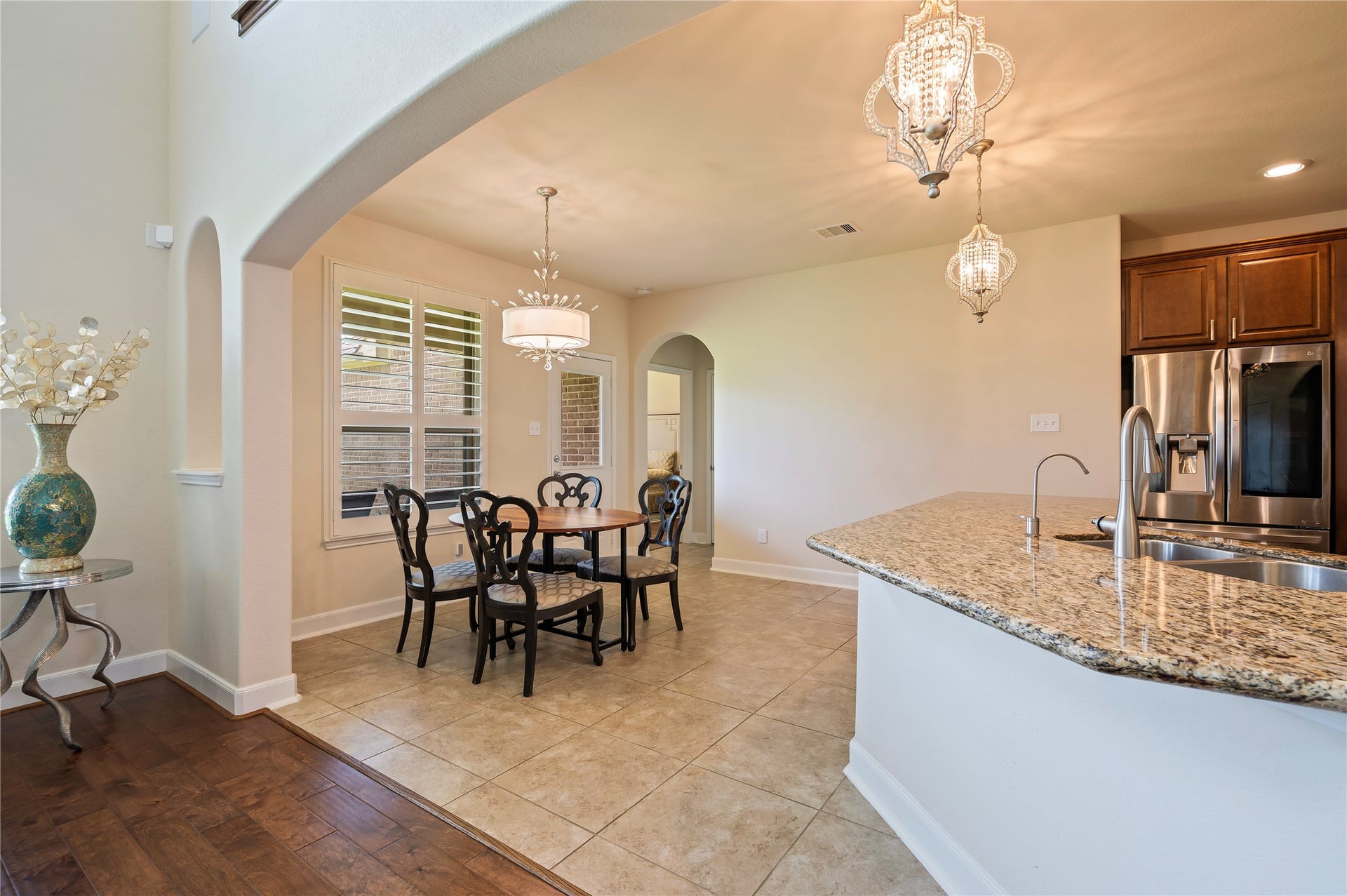 2322 Ashley Falls Lane, League City, TX 77573 Custom light fixture and plantation shutters in the breakfast area. Kitchen ceramic tile and grout has been professionally cleaned upon seller's move-out.