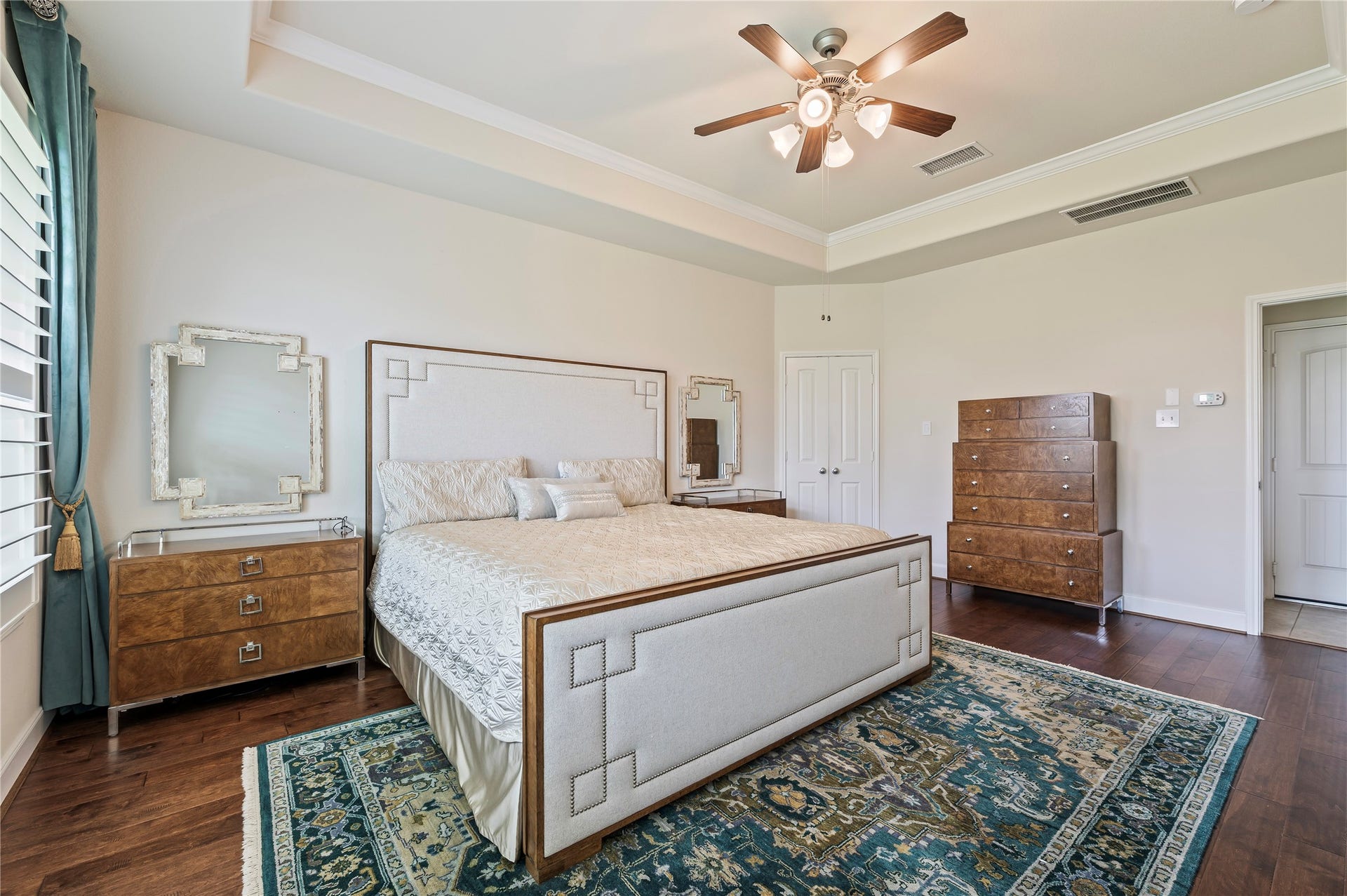 2322 Ashley Falls Lane, League City, TX 77573 Another view of the primary suite with double doors leading to the primary bathroom and trey accent ceiling.