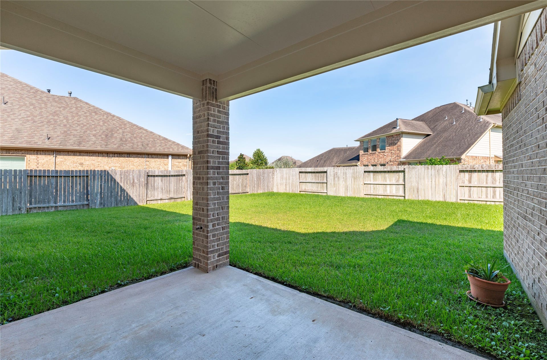 2322 Ashley Falls Lane, League City, TX 77573 Spacious back covered patio overlooking the backyard.