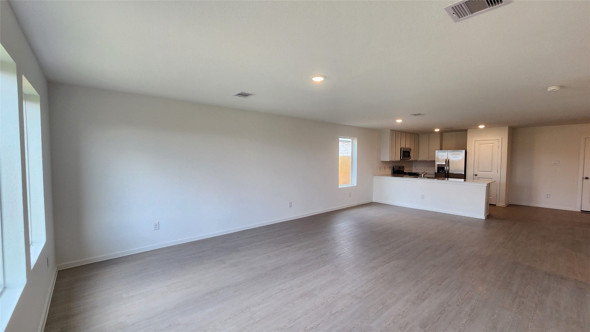 29038 Rustic Windmill Way, Hockley, TX 77447 Family room to Dining and Kitchen