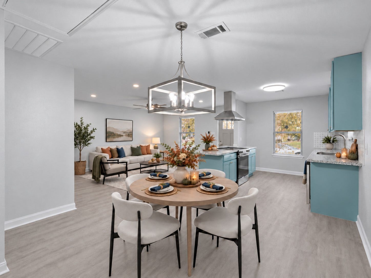 9827 Shive Drive, Houston, TX 77078 Open living, dining, and kitchen areas offer a connected space for everyday living and entertaining. Digitally staged.