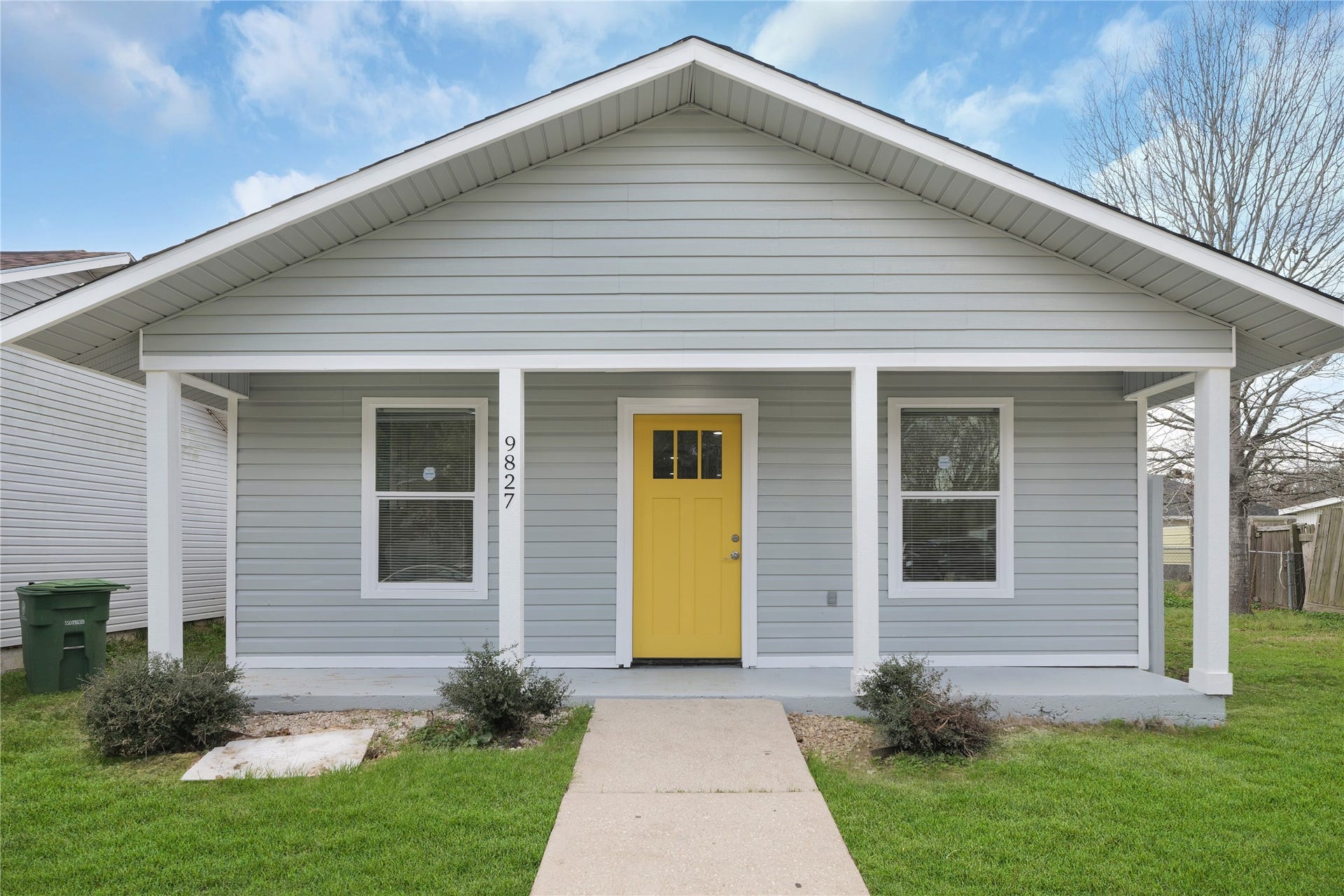 9827 Shive Drive, Houston, TX 77078 Welcome to 9827 Shive Dr! A bright yellow front door adds personality to the covered front porch.