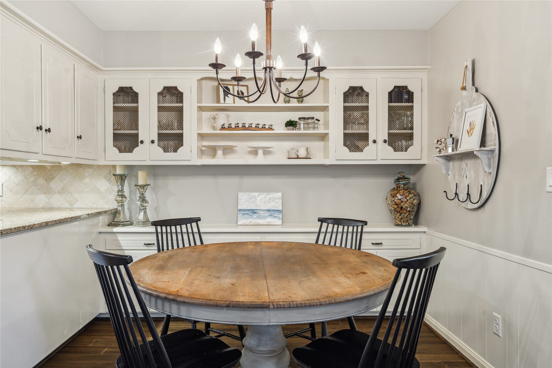10714 Piping Rock Lane, Houston, TX 77042 Built-in cabinetry, glass-front doors and open shelving add storage and character to this inviting breakfast area.