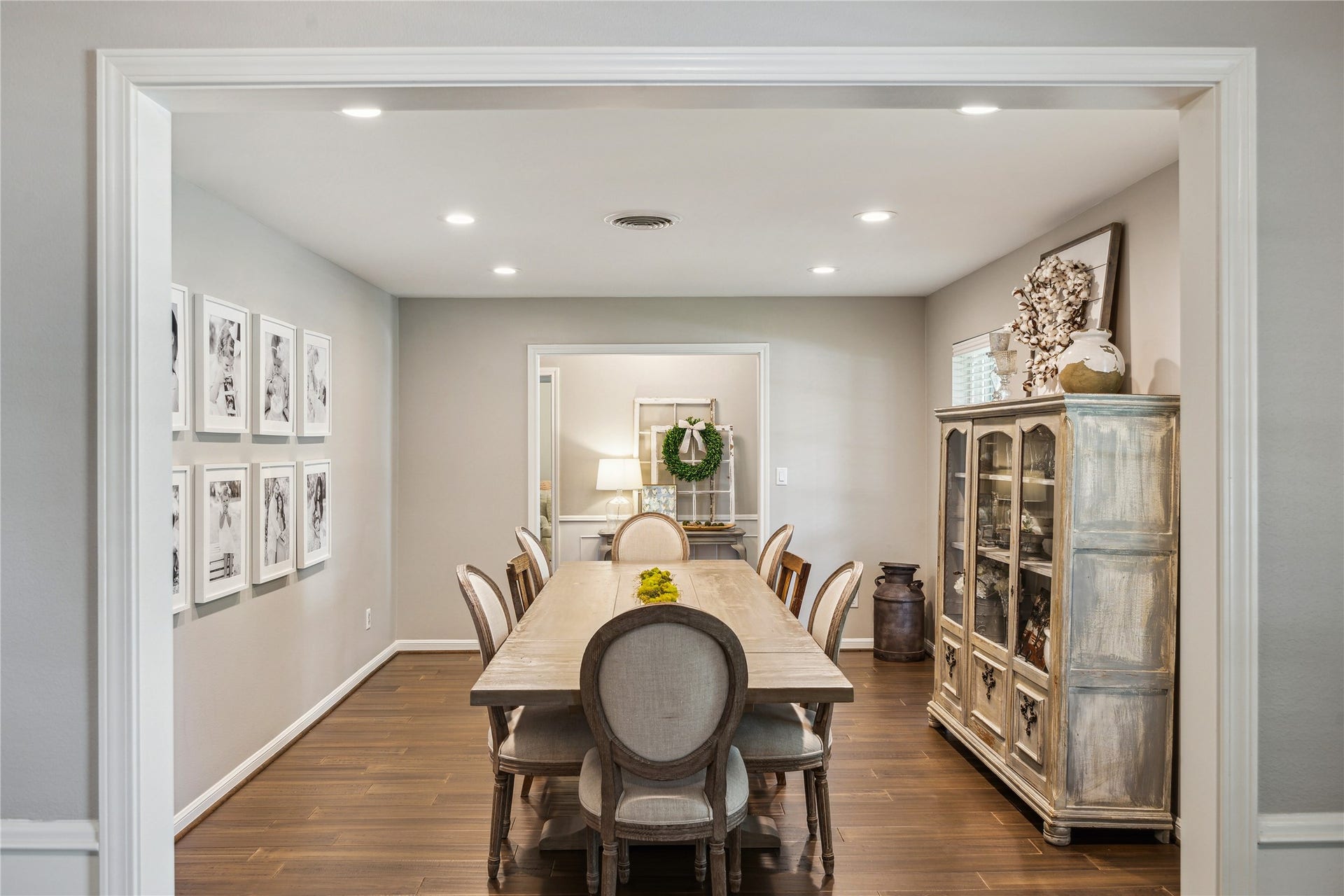 10714 Piping Rock Lane, Houston, TX 77042 The dining room offers space for a large table, with wood flooring, recessed lighting and easy access to the entryway.