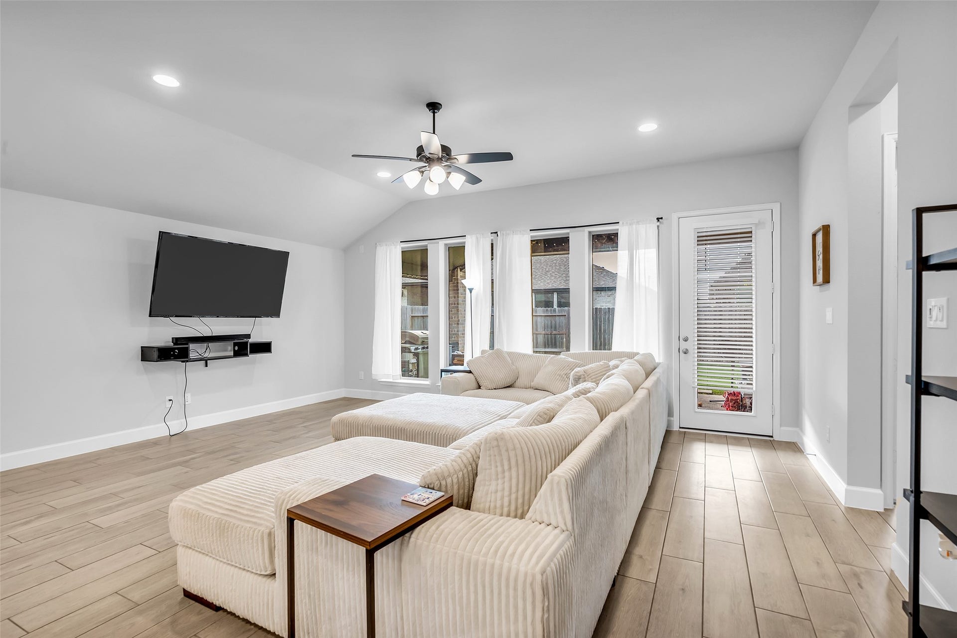 30047 Gold Finch Place, Fulshear, TX 77441 Your Spacious Living Room Complete w/ Large Windows & Full Length Glass Door For Providing Ample Natural Light, Perfect For Relaxing & Entertaining.