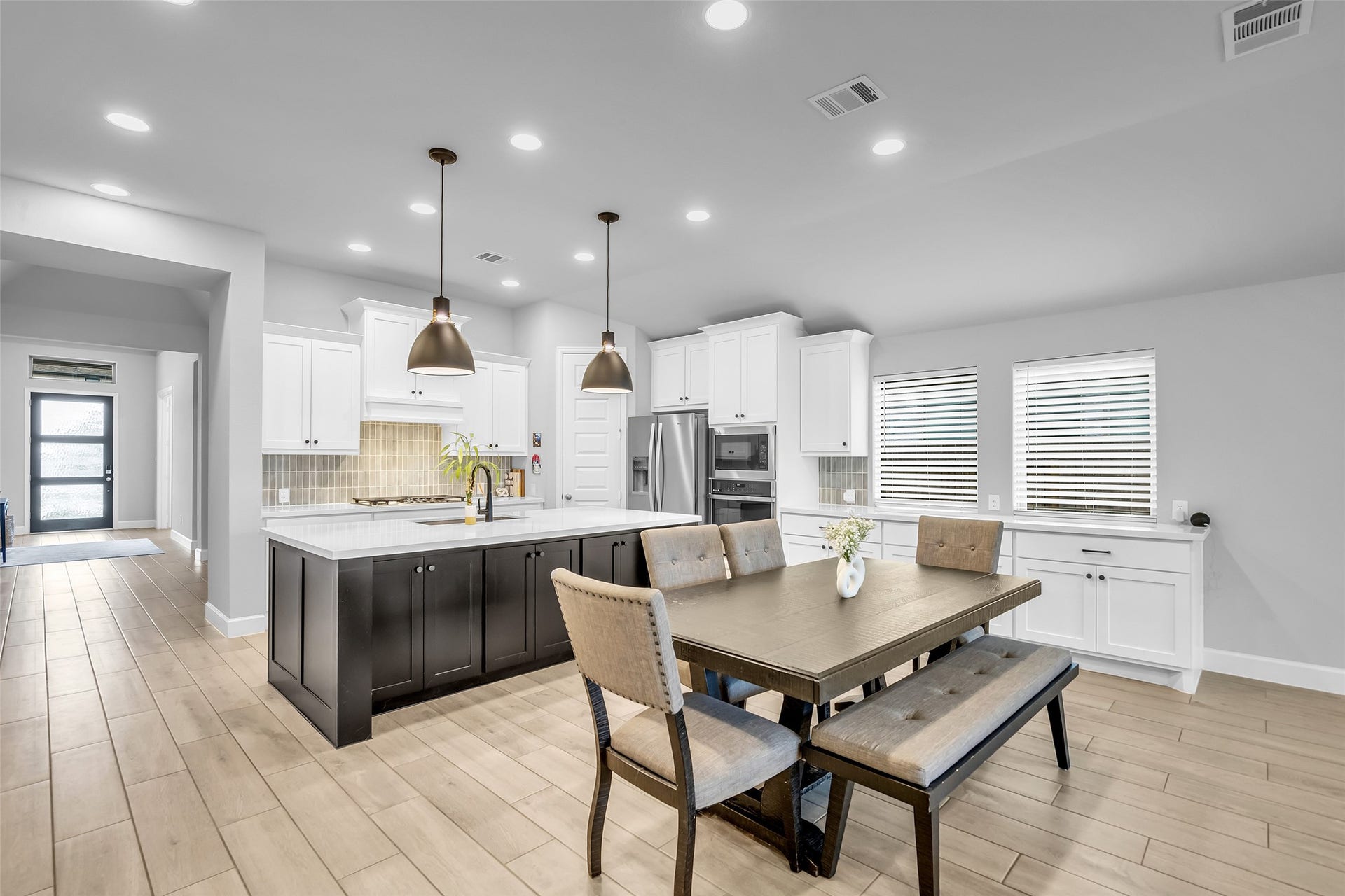 30047 Gold Finch Place, Fulshear, TX 77441 Your Lovely Kitchen Features Breakfast Bar w/ Under Cabinet Storage, Long Buffet, & Plenty of Lighting to Brighten Your Home.