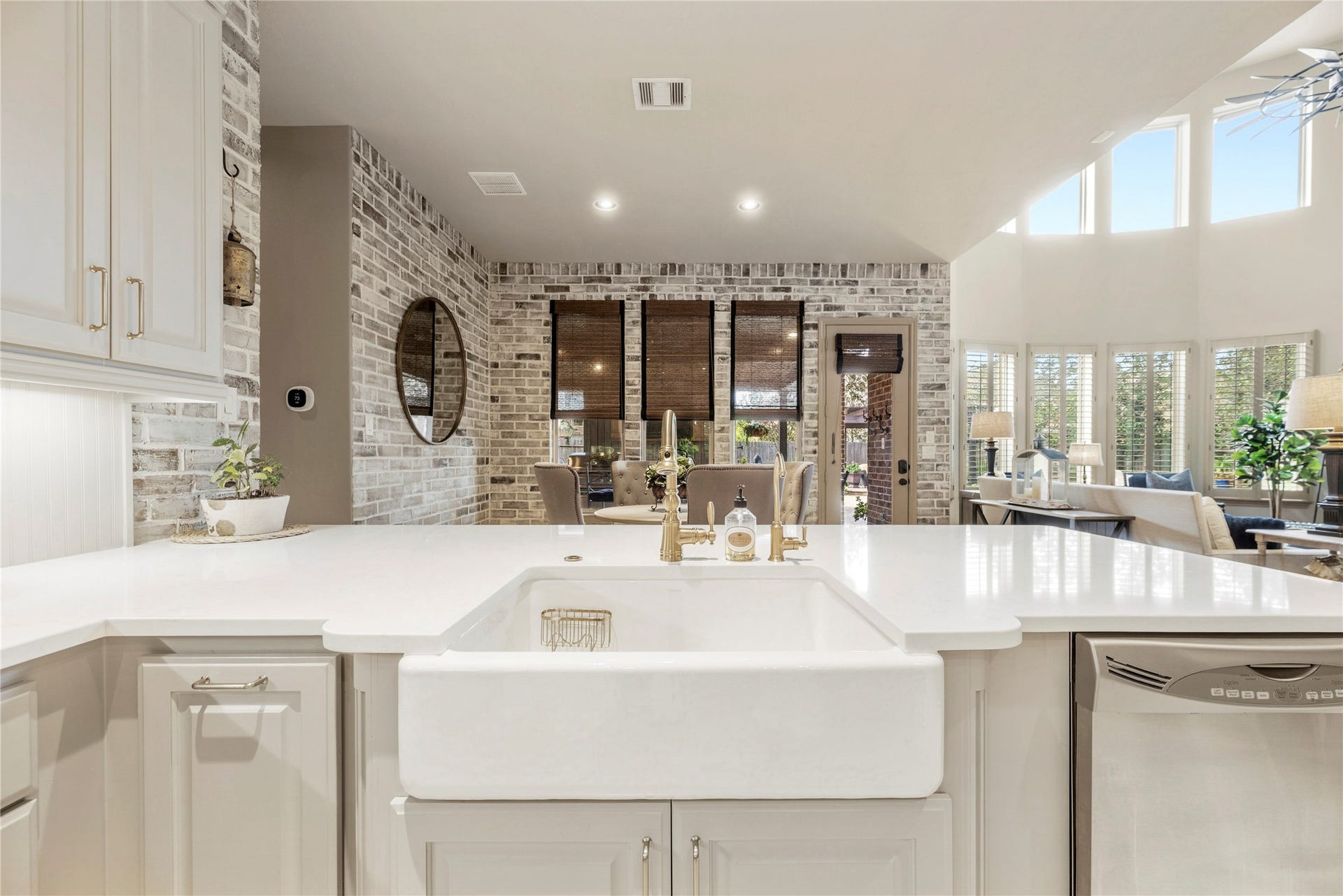 12002 Tall Haven Lane, Cypress, TX 77433 Open kitchen overlooking the breakfast area, creating a welcoming space for entertaining and everyday living.