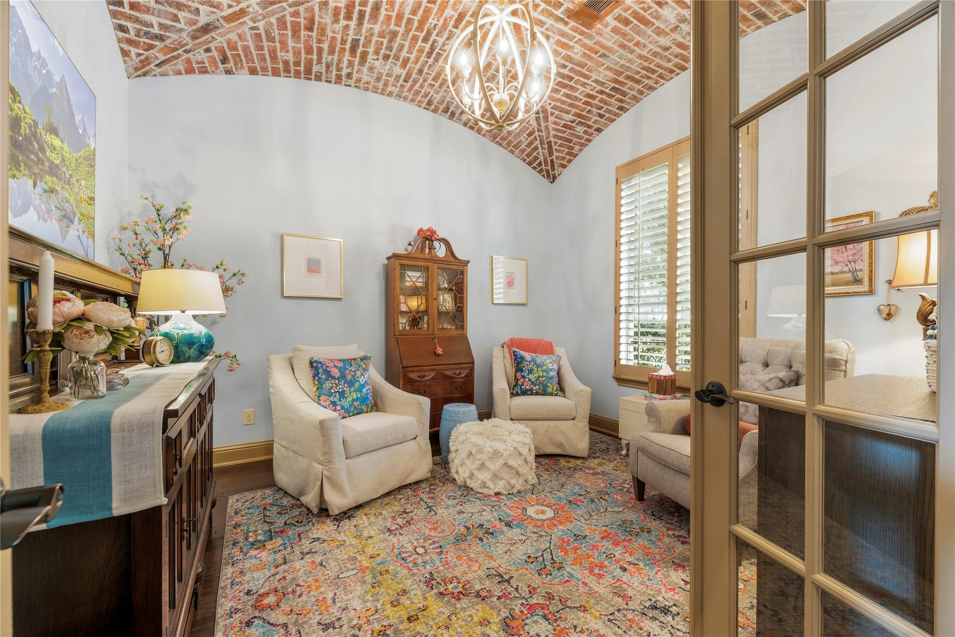12002 Tall Haven Lane, Cypress, TX 77433 Sitting room or office featuring a painted brick accent ceiling and large windows that fill the space with natural light.