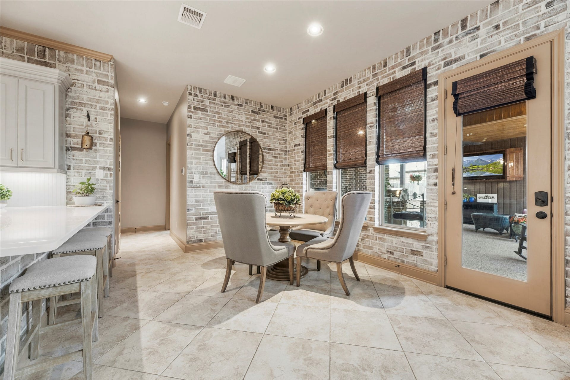 12002 Tall Haven Lane, Cypress, TX 77433 Spacious breakfast area overlooking the back porch.