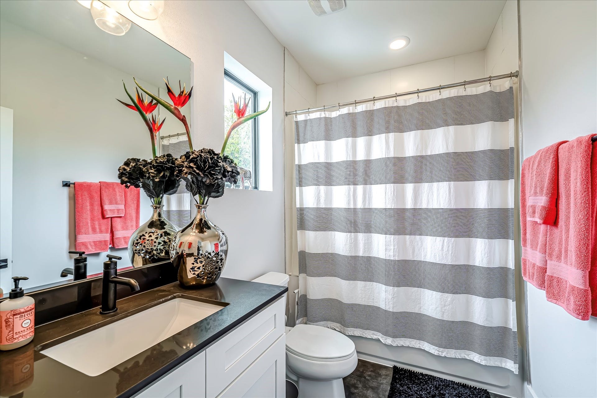 3514 Arlington Street, Houston, TX 77018 Well-appointed secondary bathroom designed with modern finishes and timeless style.