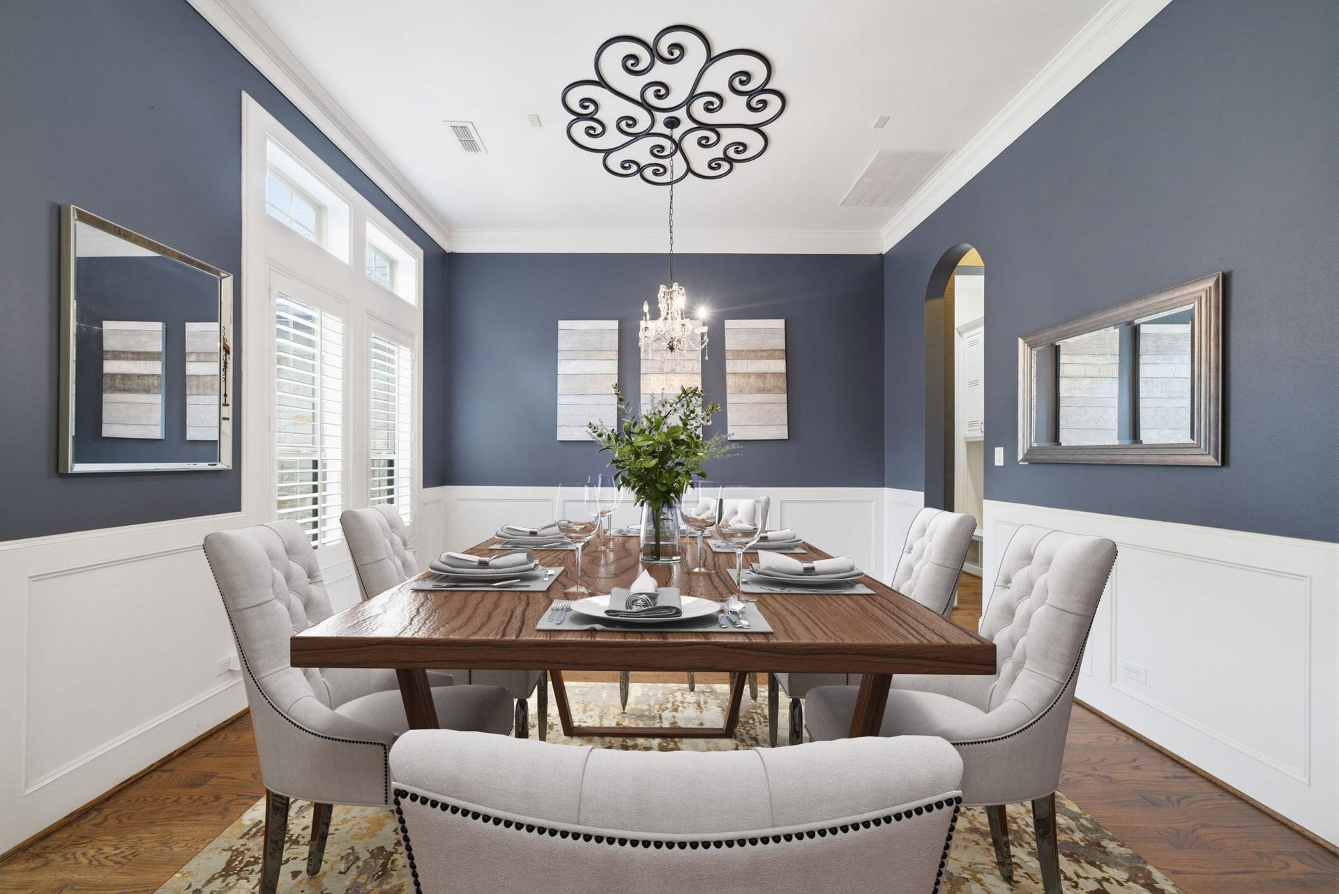 1510 Whispering Pines Drive, Houston, TX 77055 Spacious formal dining room with wainscoting. Virtually staged. The navy walls in this room were recently painted white for an updated look.