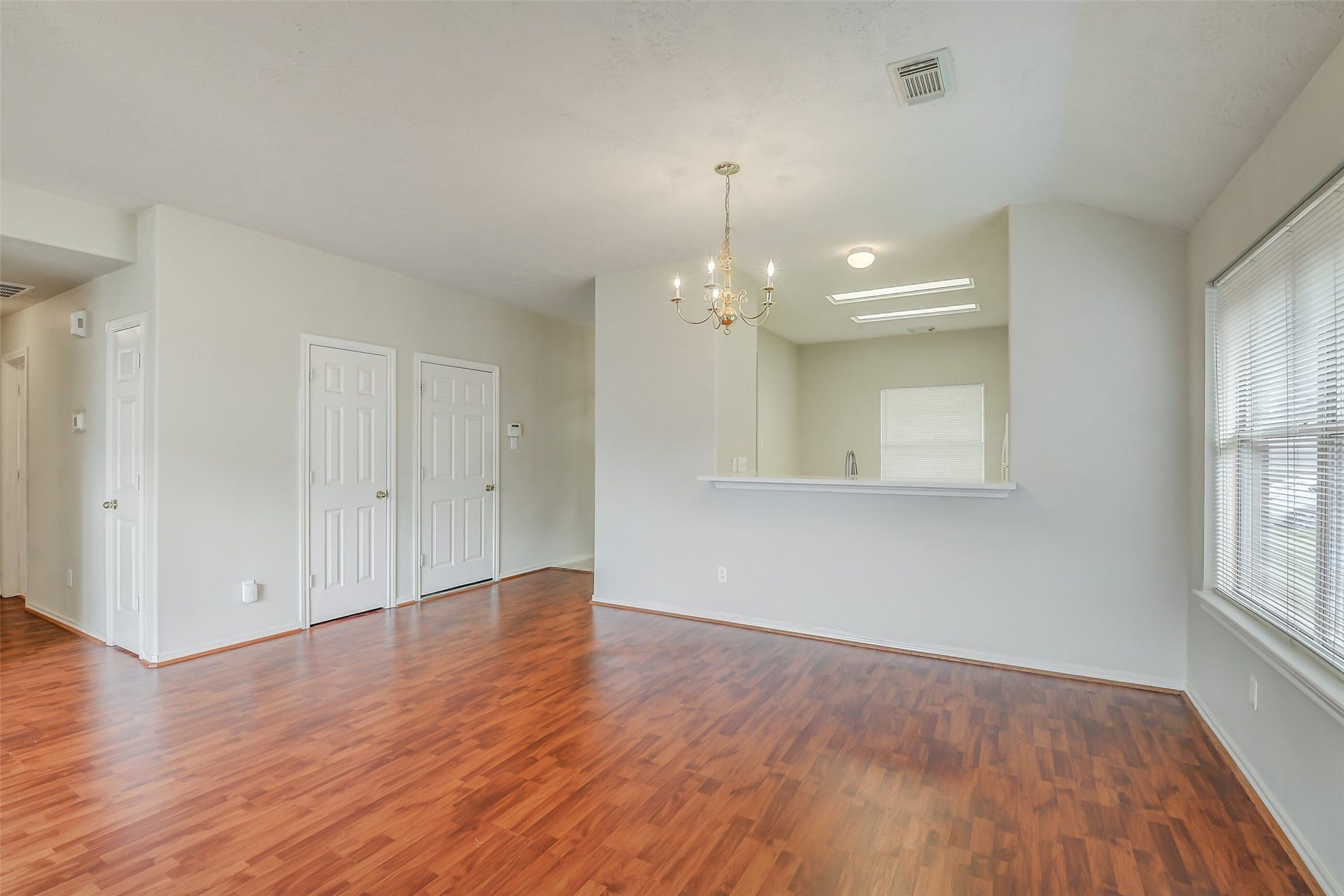 12115 Lucky Meadow Dr, Tomball, TX 77375 Living room leads to secondary bedrooms and bath.