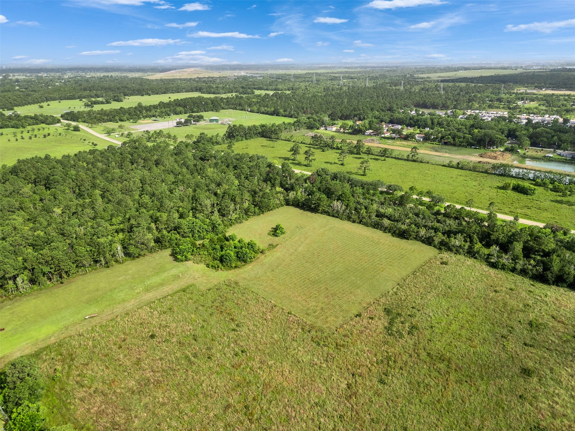 5924 Pecan Park, Hitchcock, TX 77563 Peaceful acreage in the heart of Hitchcock.