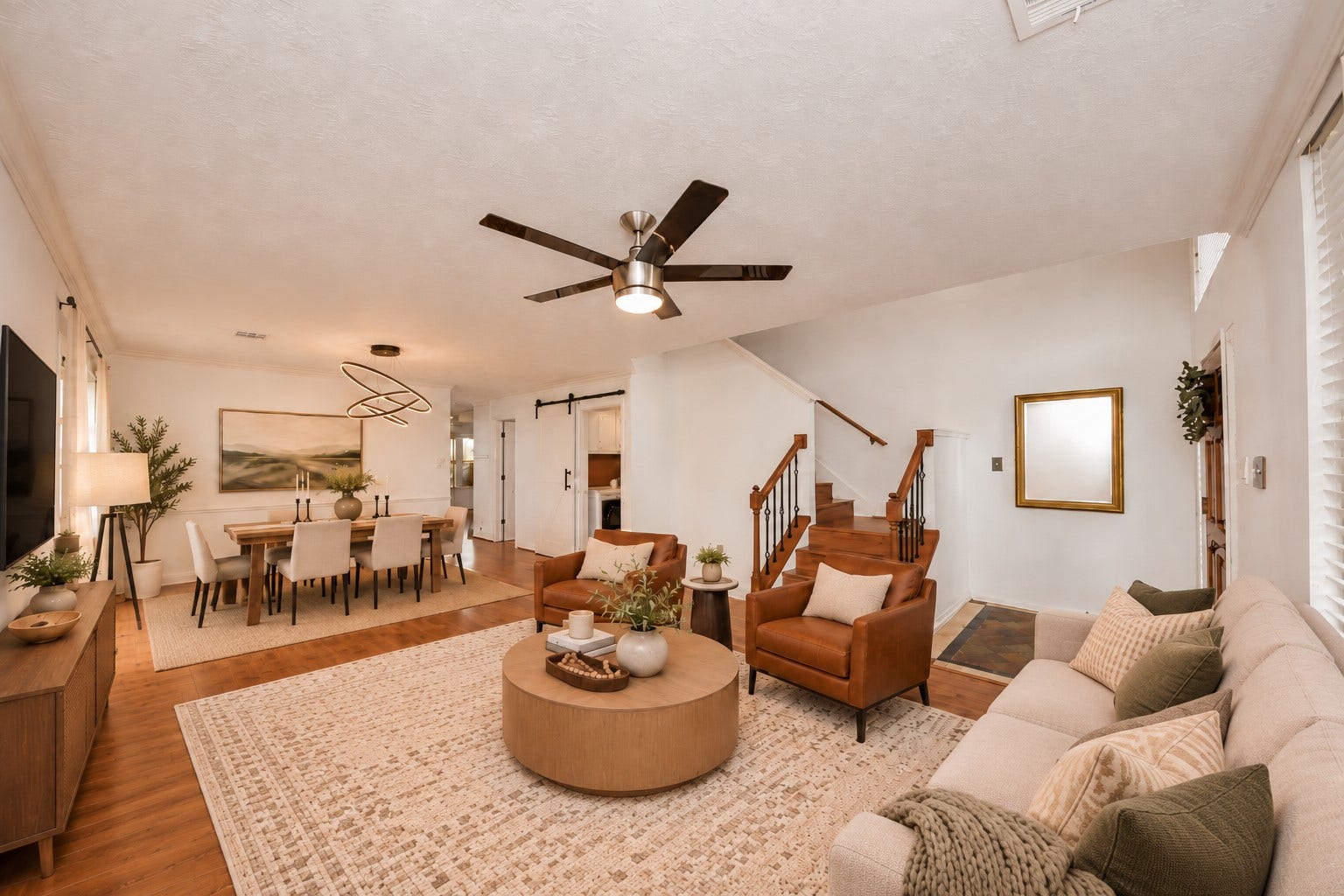 15007 Moss Boulder Court, Houston, TX 77084 Virtually staged living area with an open flow toward the dining space and staircase.