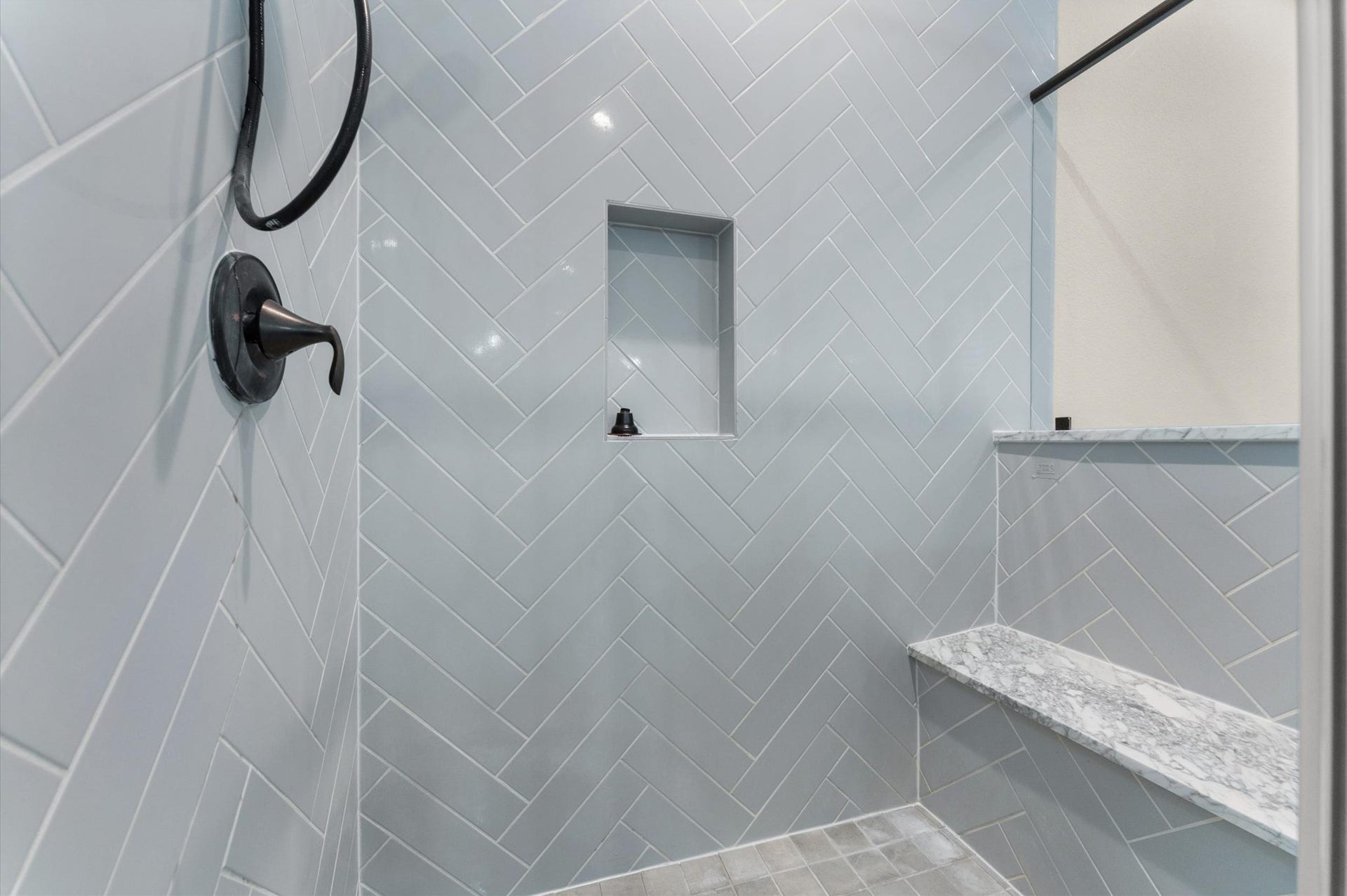 Primary Walk-in shower with built-in bench seating
