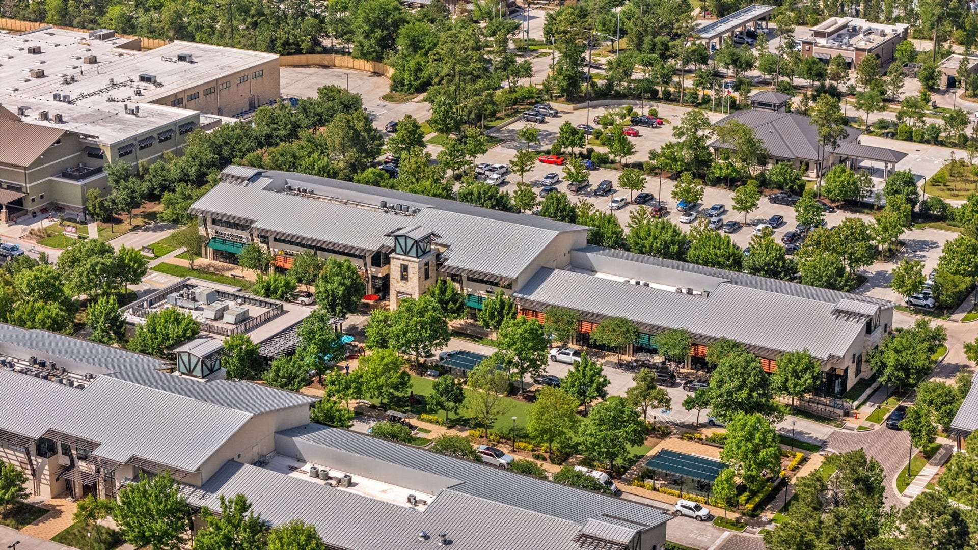 18 Gentle Branch Place, The Woodlands, TX 77375 Home to favorite spots like Fieldings Local Kitchen & Bar, Crust Pizza Co., and specialized boutiques, this center provides residents with high-end dining and essential services just a short stroll from their front doors.