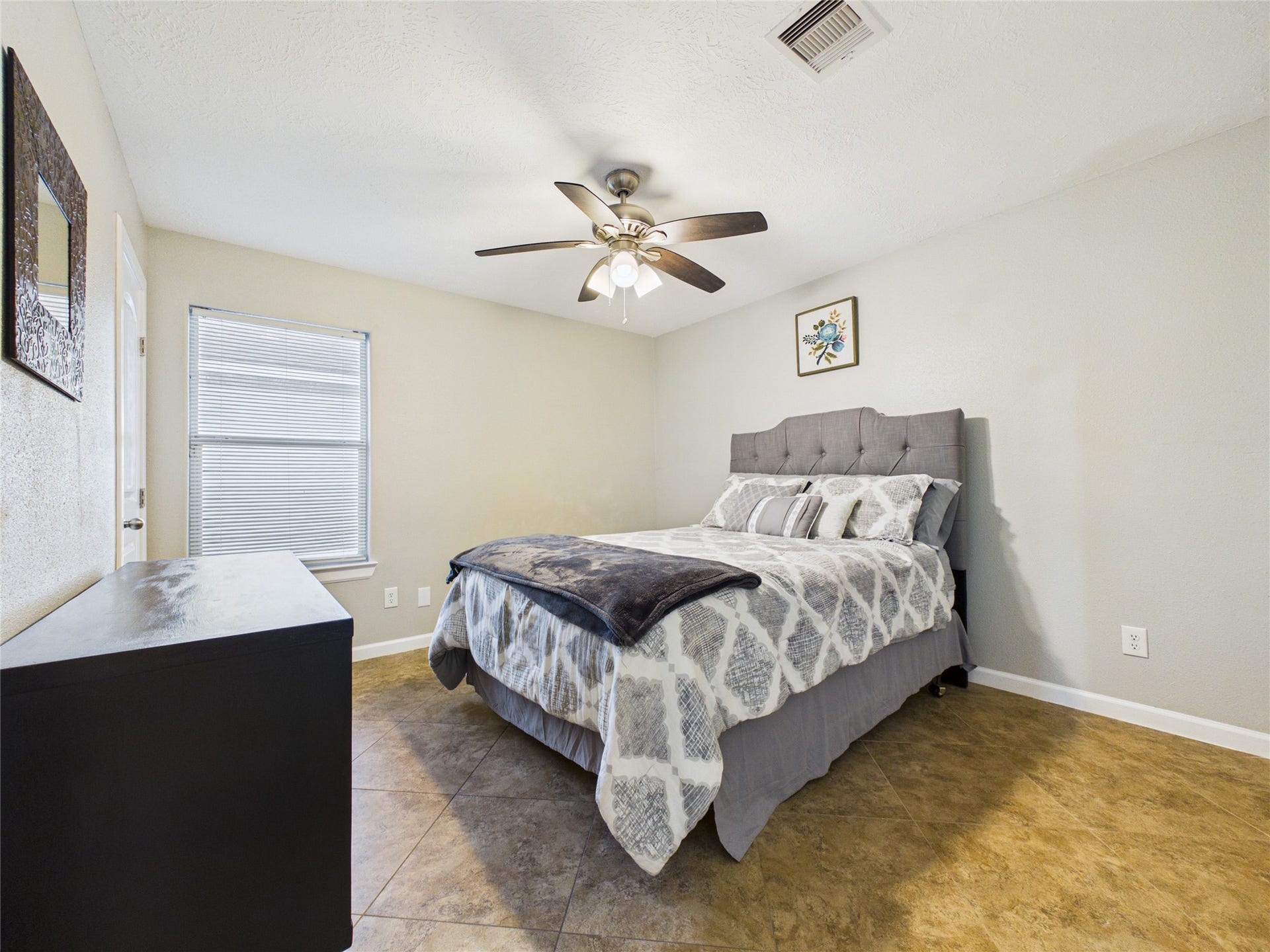 9022 Barracuda Drive, Texas City, TX 77591 Discover the inviting charm of this spacious secondary bedroom.
