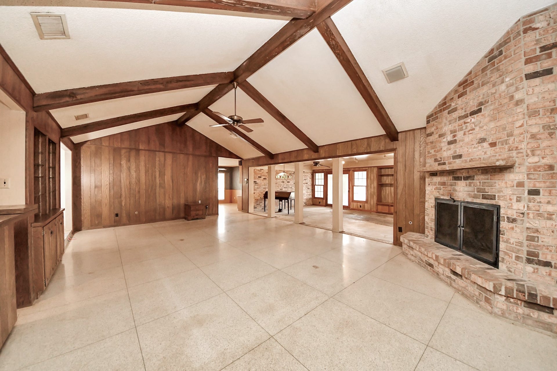 17115 County Road 831, Pearland, TX 77584 Another view of the impressive living area with oversized wood burning fireplace.