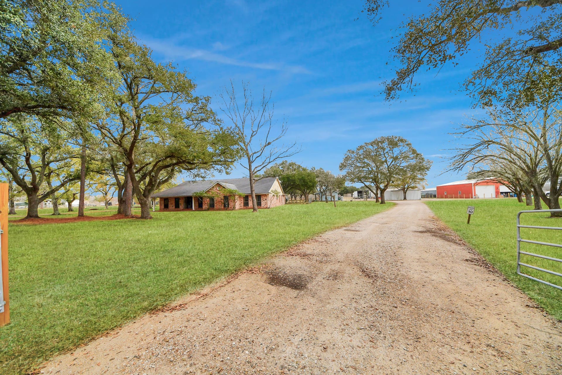 17115 County Road 831, Pearland, TX 77584 The second driveway leads to the guest home with kitchen and bath, as well as the shop
