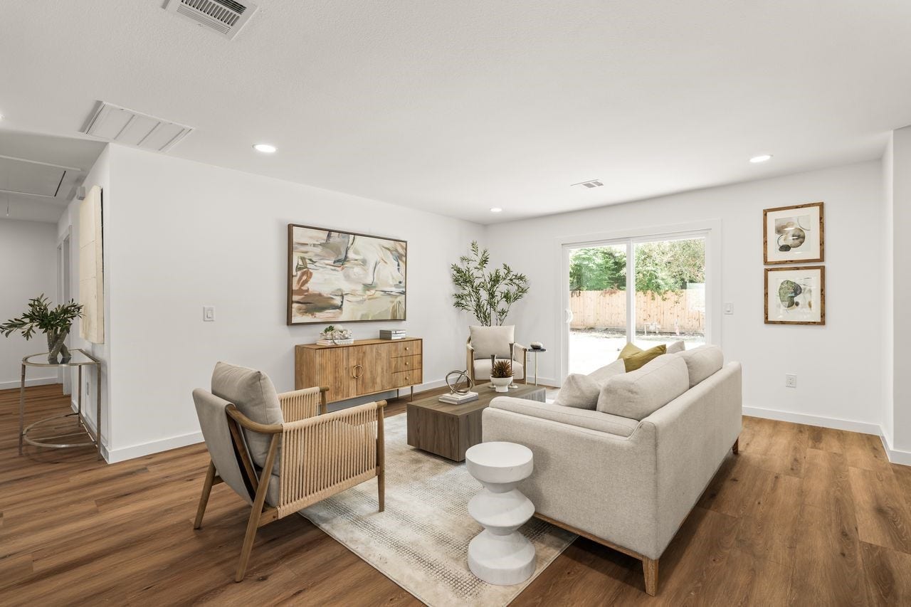 5207 Hummingbird Street, Houston, TX 77035 Open and inviting living space with seamless flow into the kitchen and dining areas