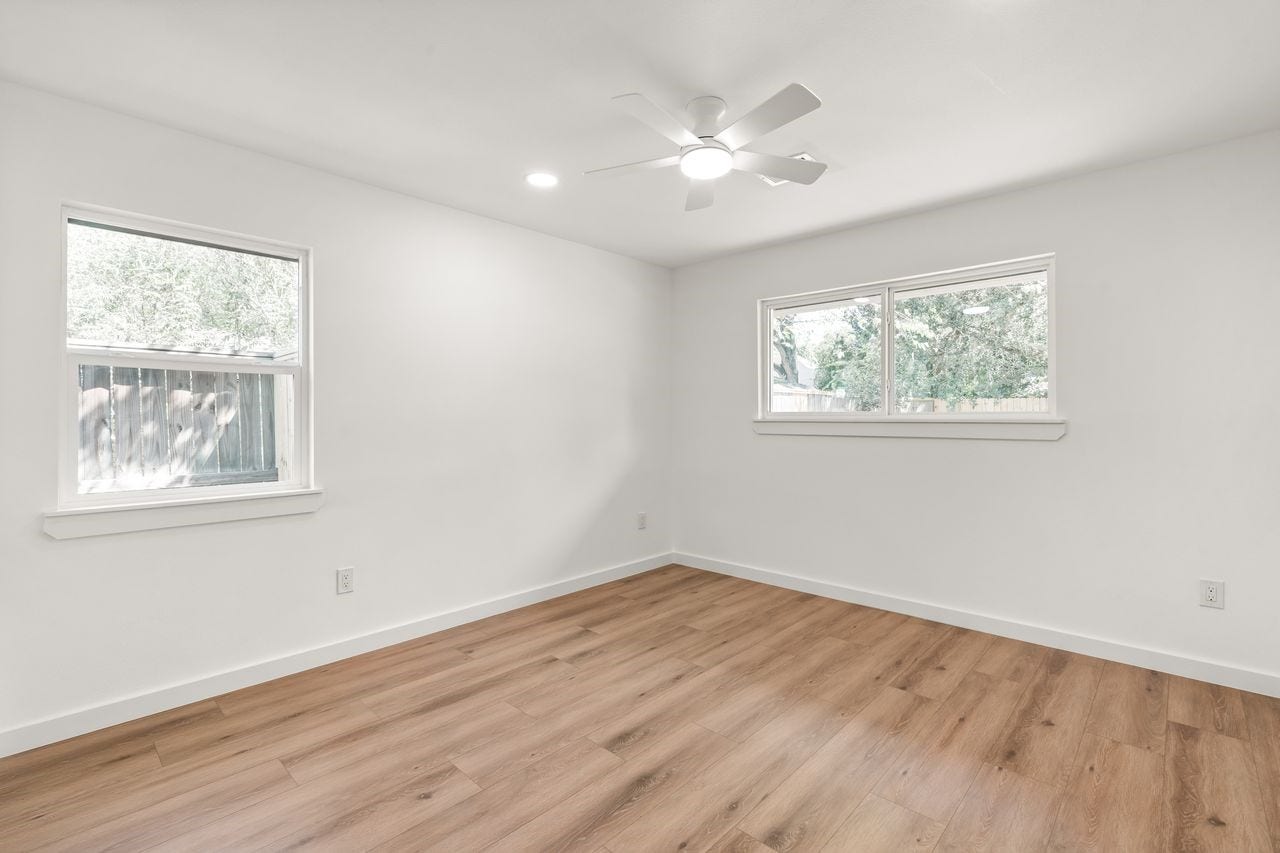 5207 Hummingbird Street, Houston, TX 77035 Comfortable secondary bedroom with natural light and ample closet