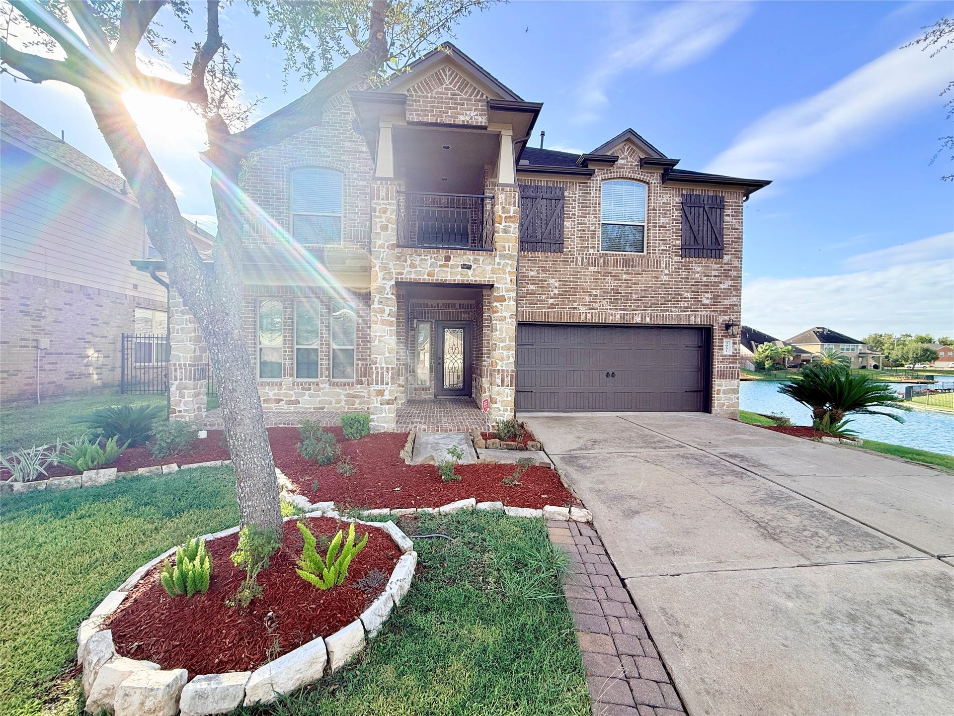 3951 Amalfi Shores Court, Missouri City, TX 77459 lakefront front/side balcony in cul-de-sac with private pier for resident fishing and pedal boating