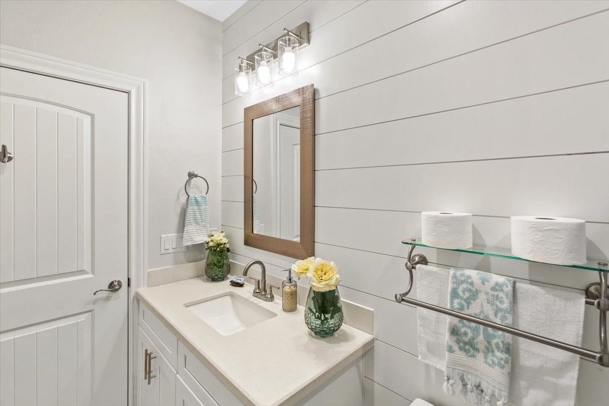3211 Avenue K, Galveston, TX 77550 Shiplap walls and nice vanity.