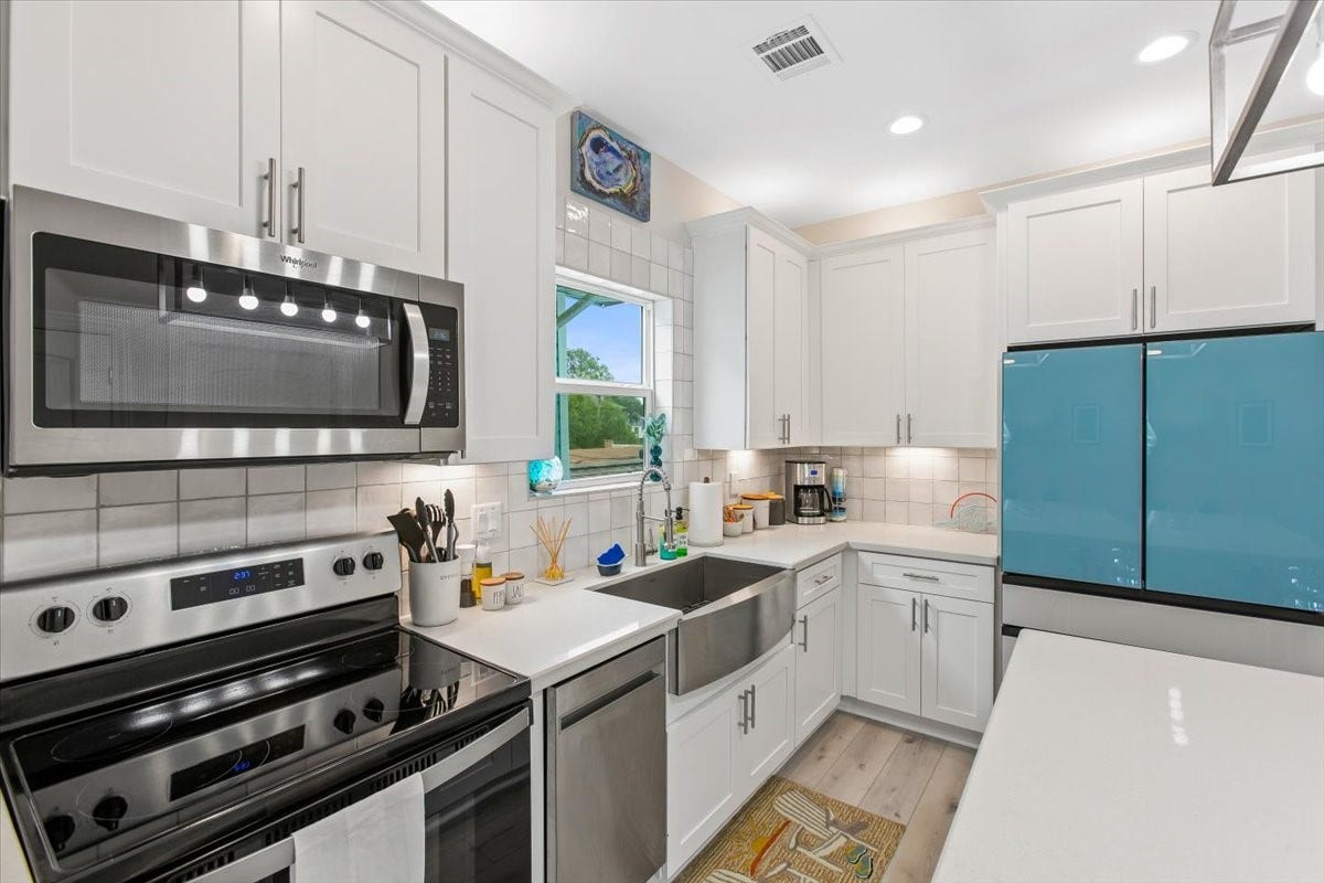 3211 Avenue K, Galveston, TX 77550 Quality appliance package with stainless deep basin sink.