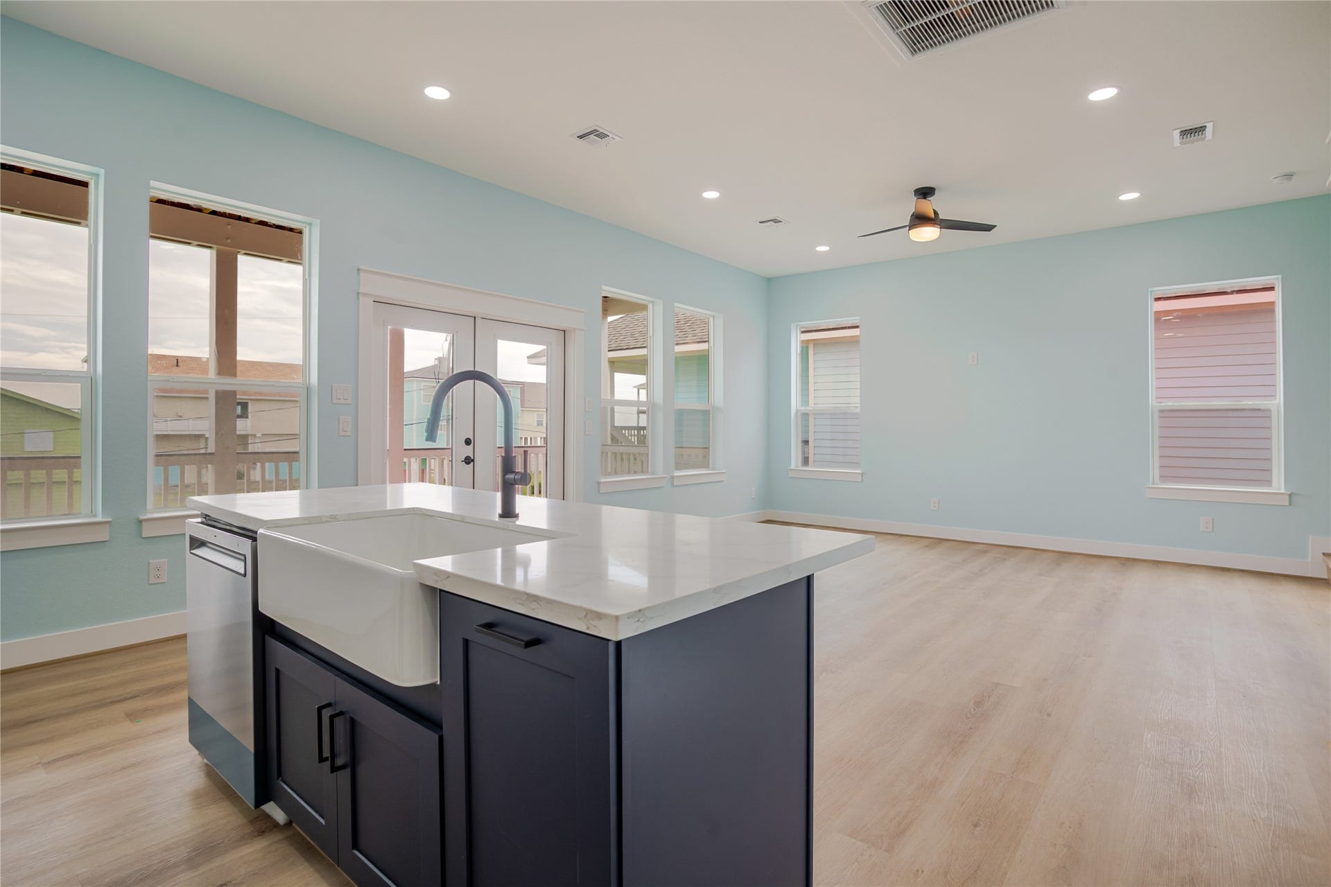 17518 Bristow Drive, Galveston, TX 77554 Farmers oversized sink and modern stain less faucet. Navy color accent for your new modern beach house!