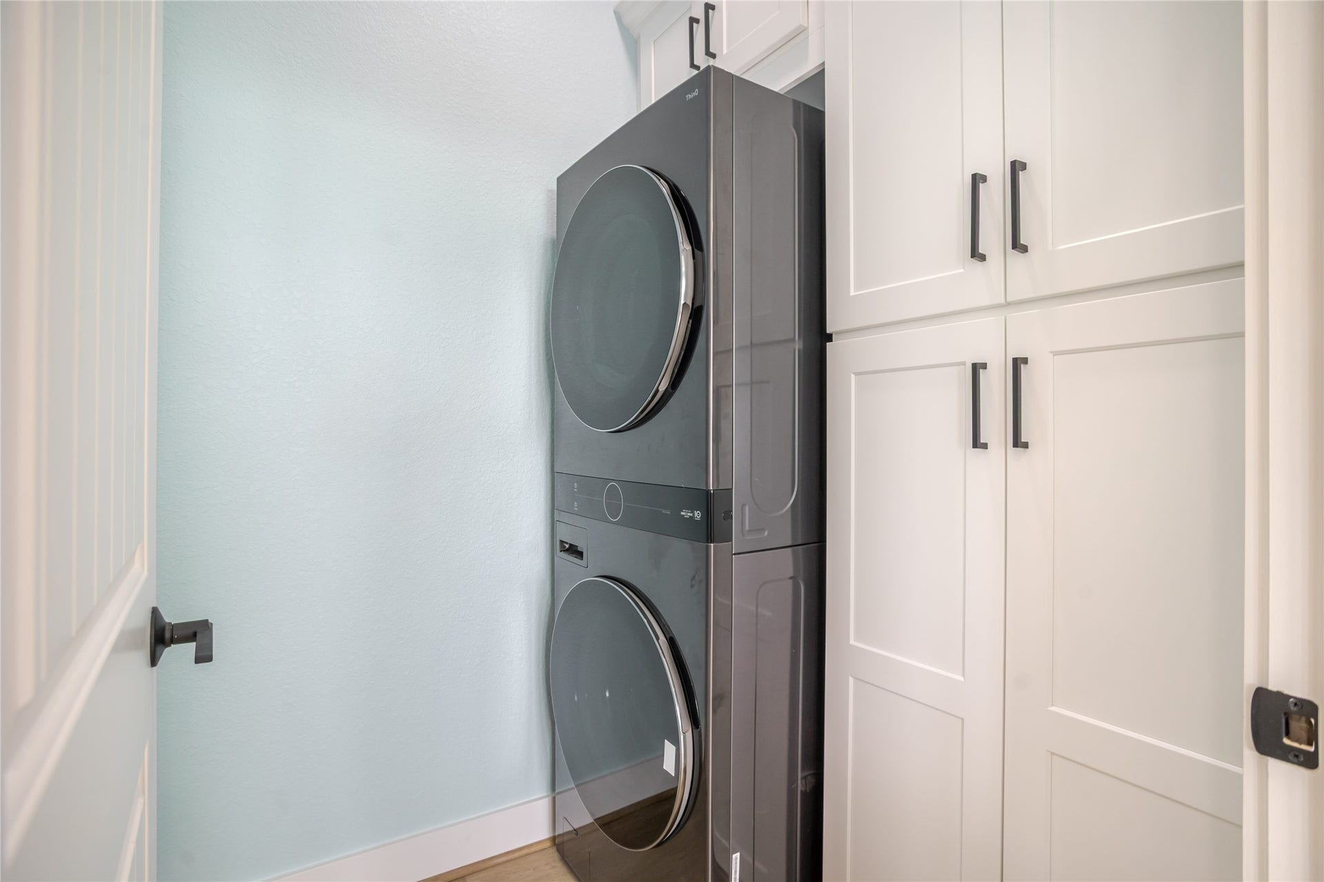 17518 Bristow Drive, Galveston, TX 77554 Large double stacked washer and dryer on the main floor with lots of cabinet space