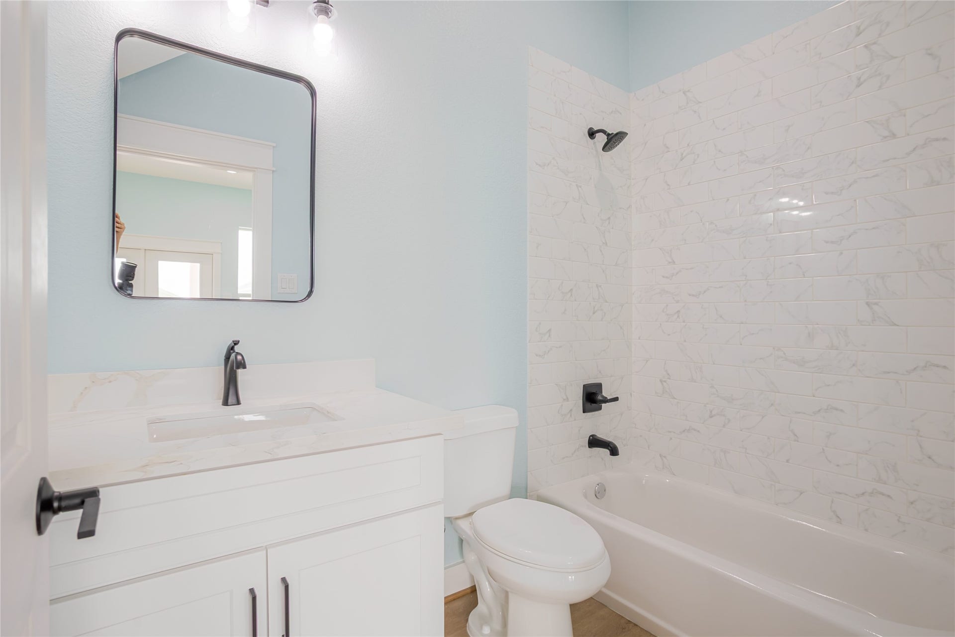 17518 Bristow Drive, Galveston, TX 77554 White bath with contemporary black accents