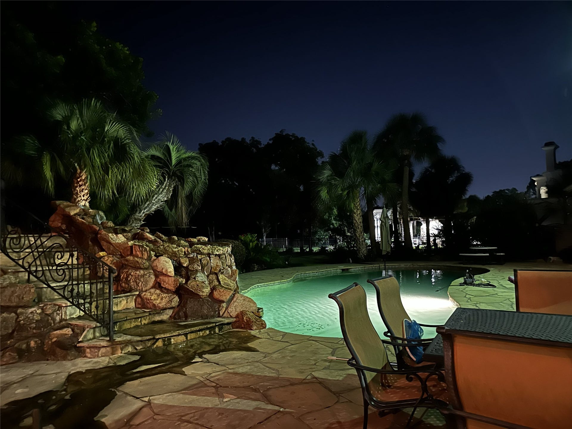 1830 Forest Gate Circle, Sugar Land, TX 77479 In the evening, the lighting in the pool area is great for a night swim.