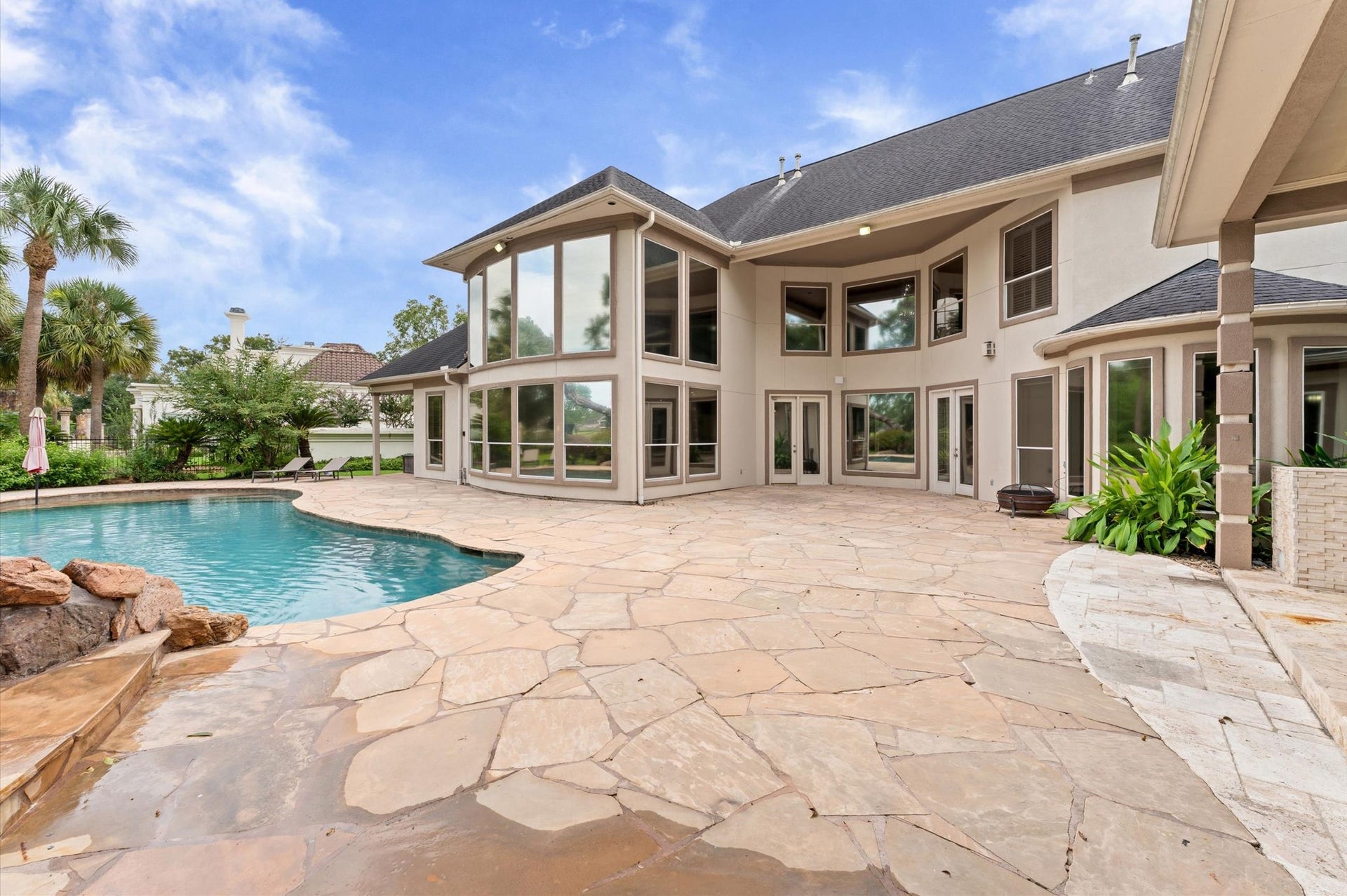 1830 Forest Gate Circle, Sugar Land, TX 77479 From the cabana, this view is of the pool and back of the home.