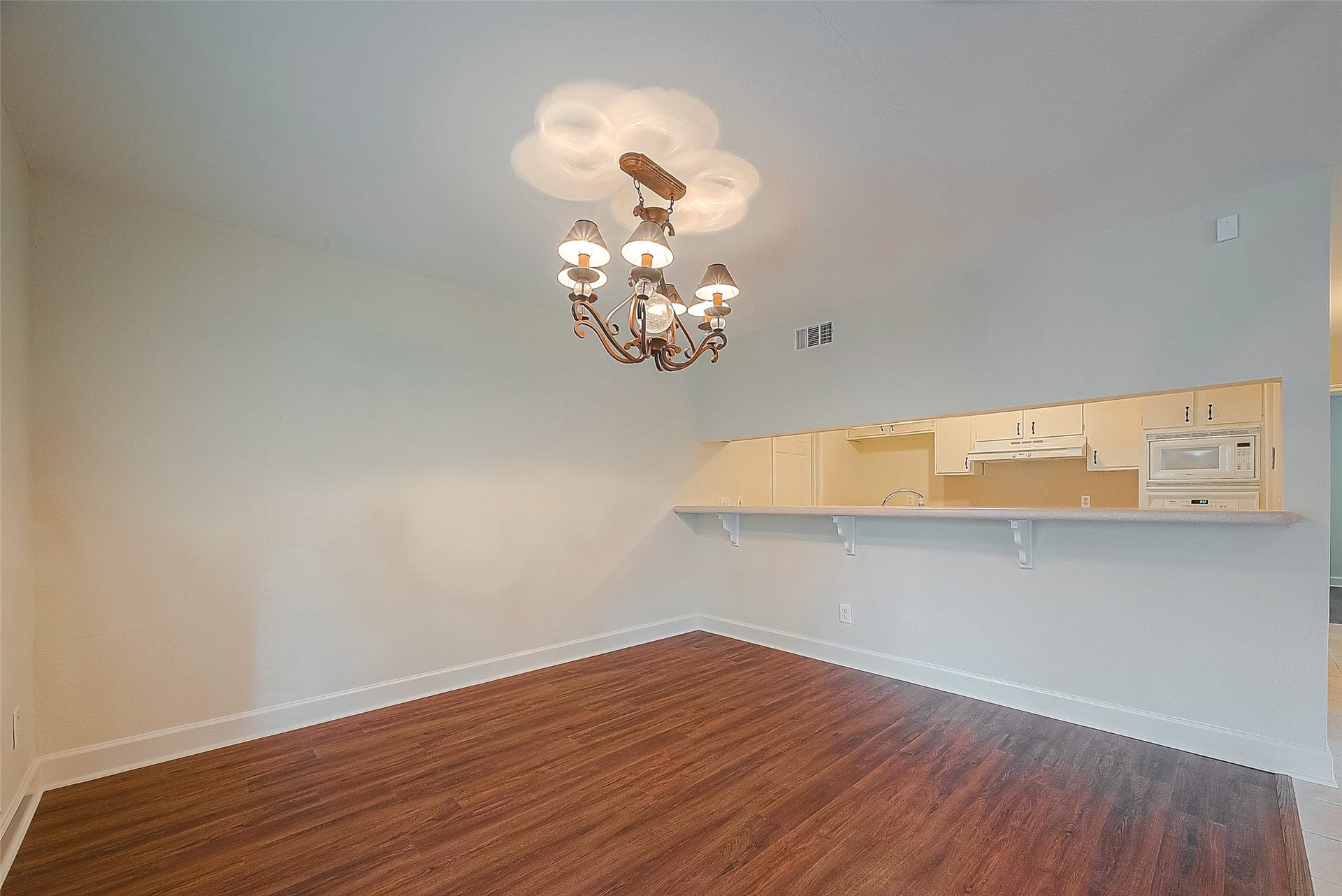 20 Champions Colony E, Houston, TX 77069 A dining area with a view facing the kitchen can create a seamless flow between meal preparation and dining, making it ideal for both everyday living and entertaining guests.